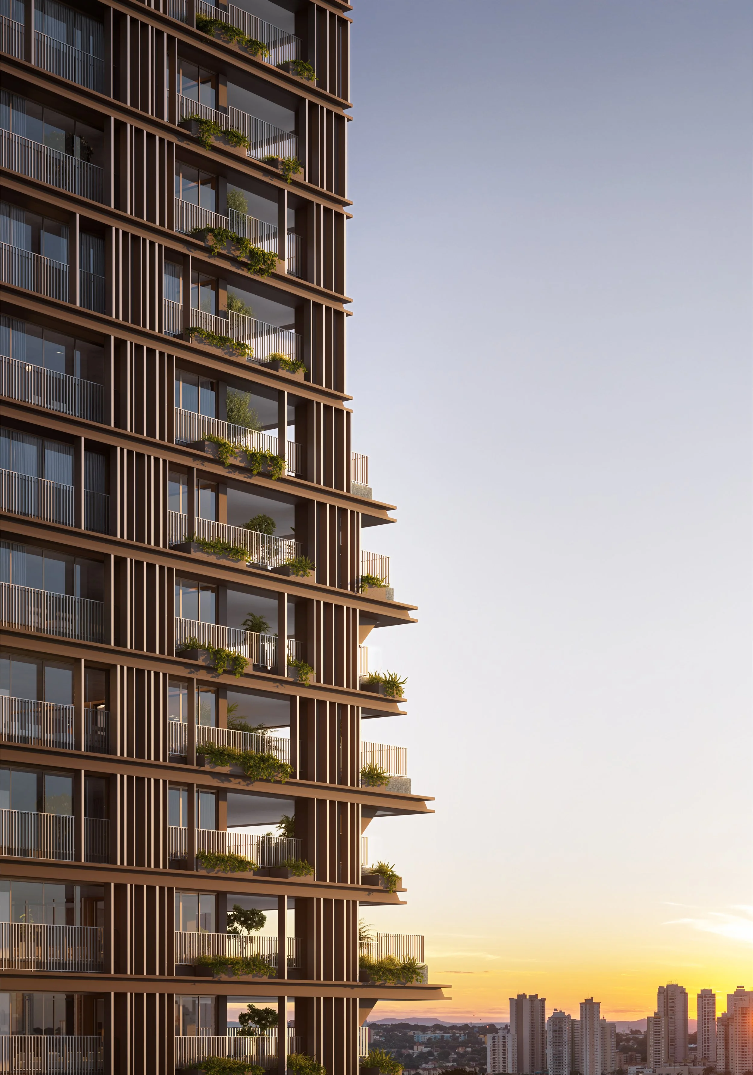 Prédio residencial em Goiânia alto com varandas e plantas, ao entardecer, vista de uma cidade com vários edifícios ao fundo.