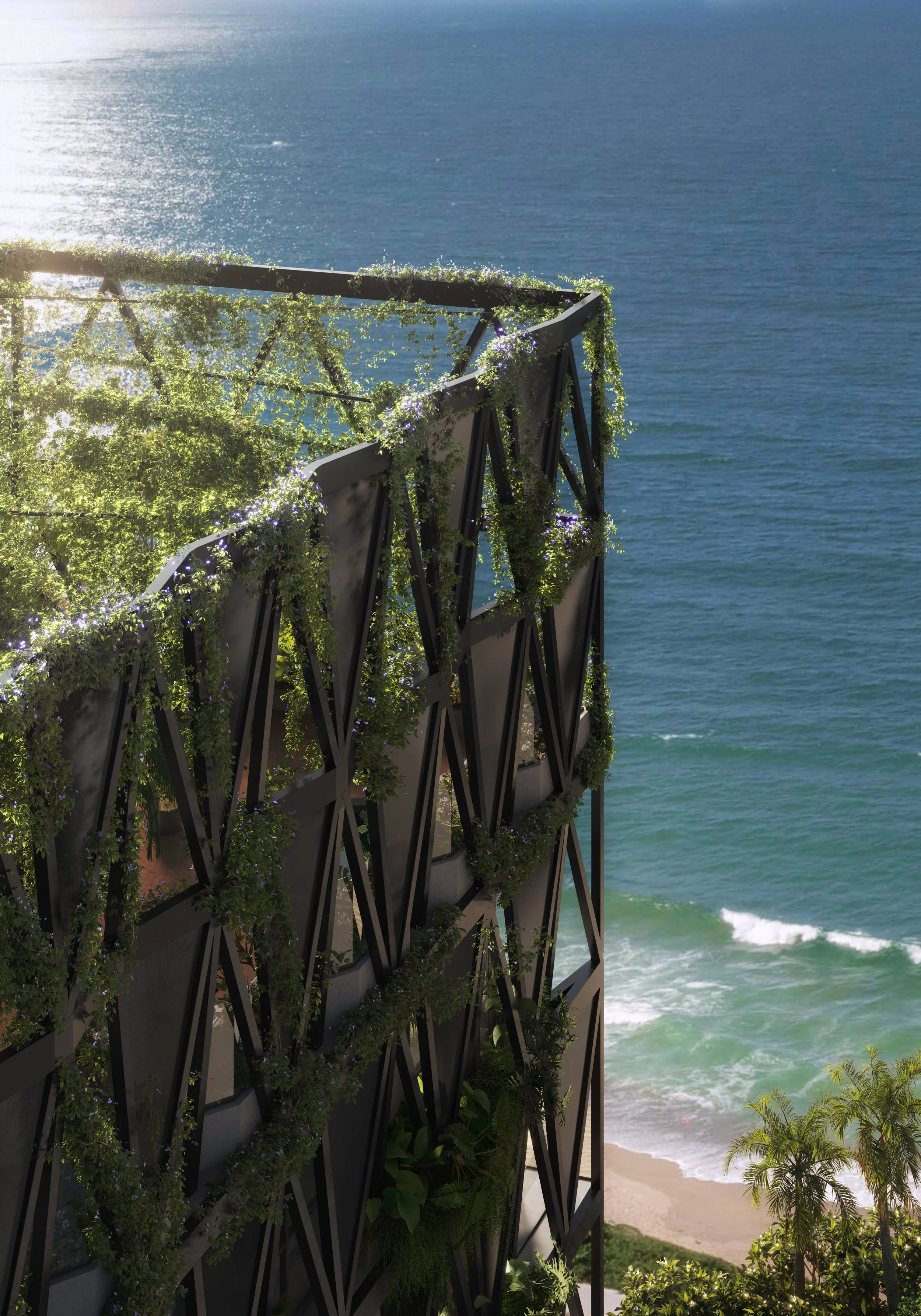 Edifício com fachada verdejante, árvores e plantas, à beira do mar com praia e ondas ao fundo.