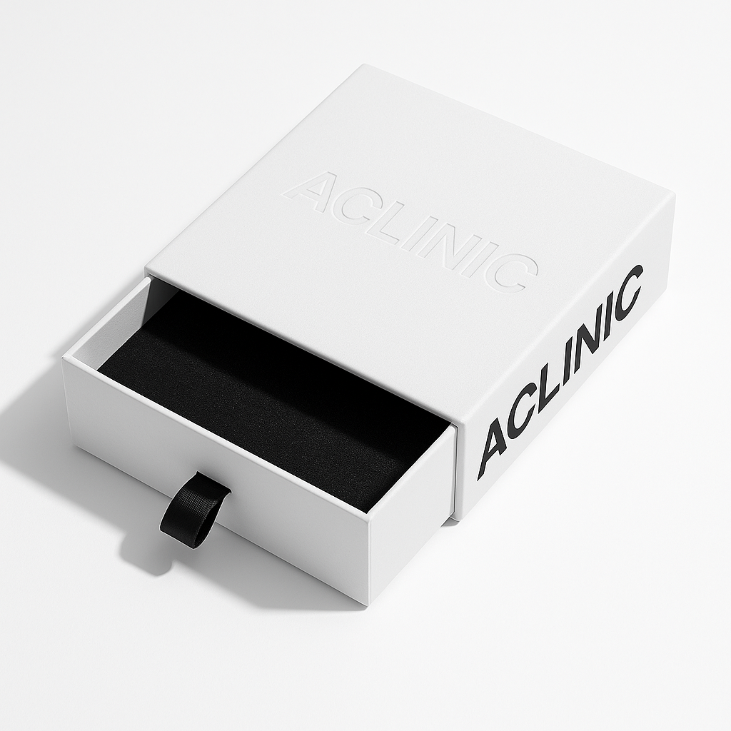 Wit doosje met zwarte binnenkant en zwarte lus, met 'ACLINC' erop, geopend.