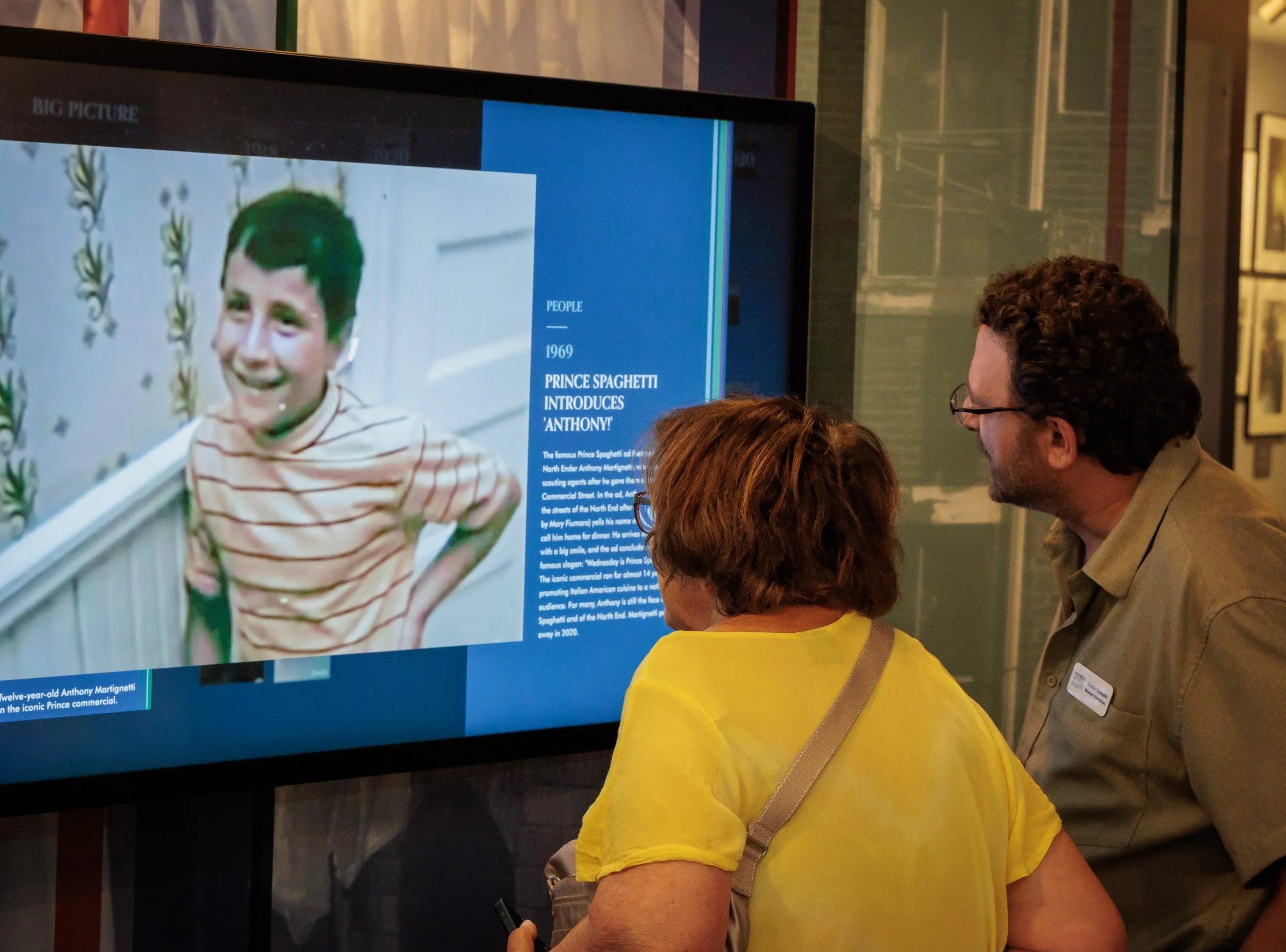 Visitors at the screen telling the story of the 1969 Prince Spaghetti ad filmed on Prince Street.