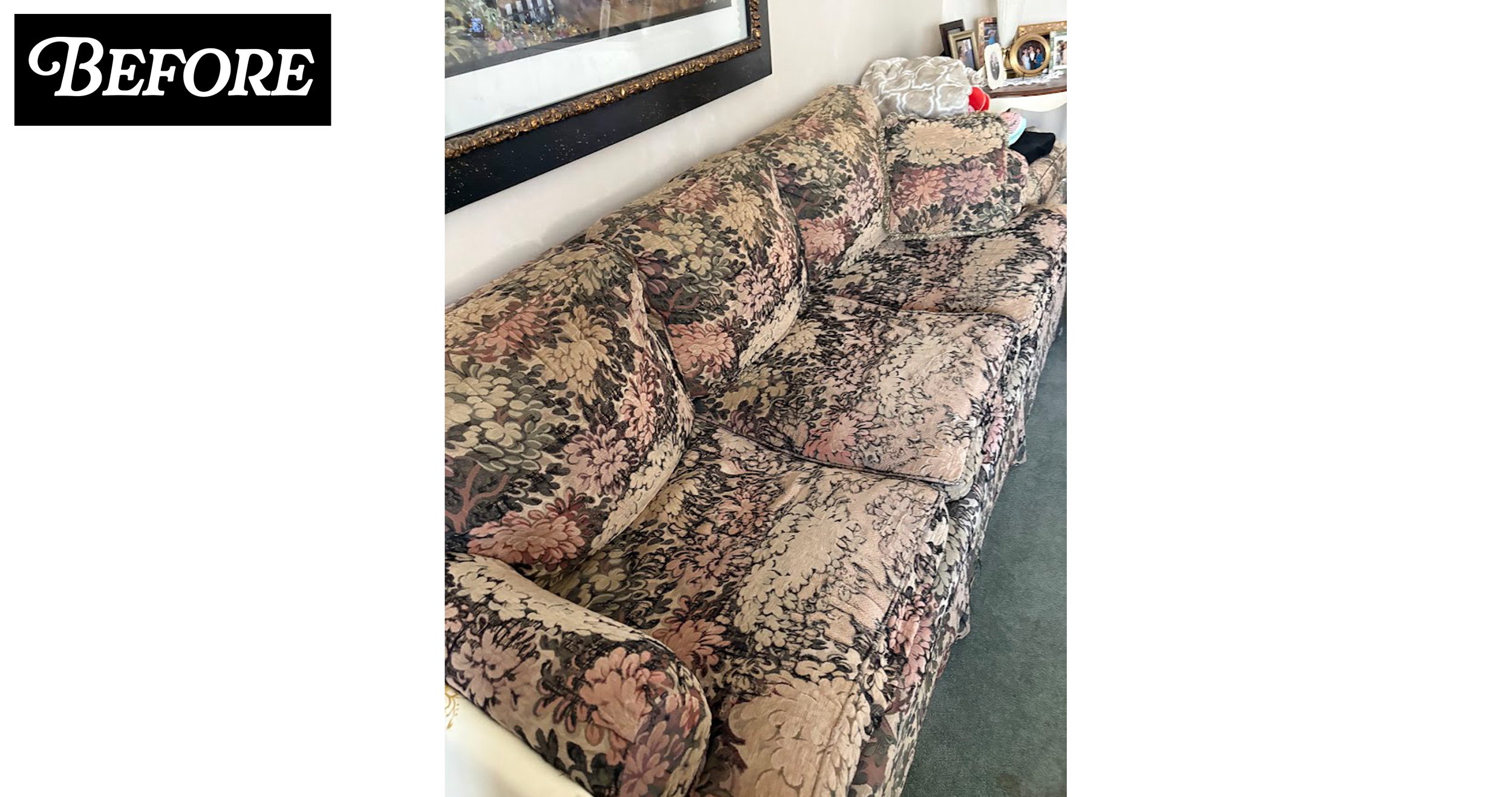 A floral-patterned sofa with multiple cushions and stuffed animals in a living room. A large framed artwork hangs above the sofa, and there are picture frames and decorative items on a side table in the background.