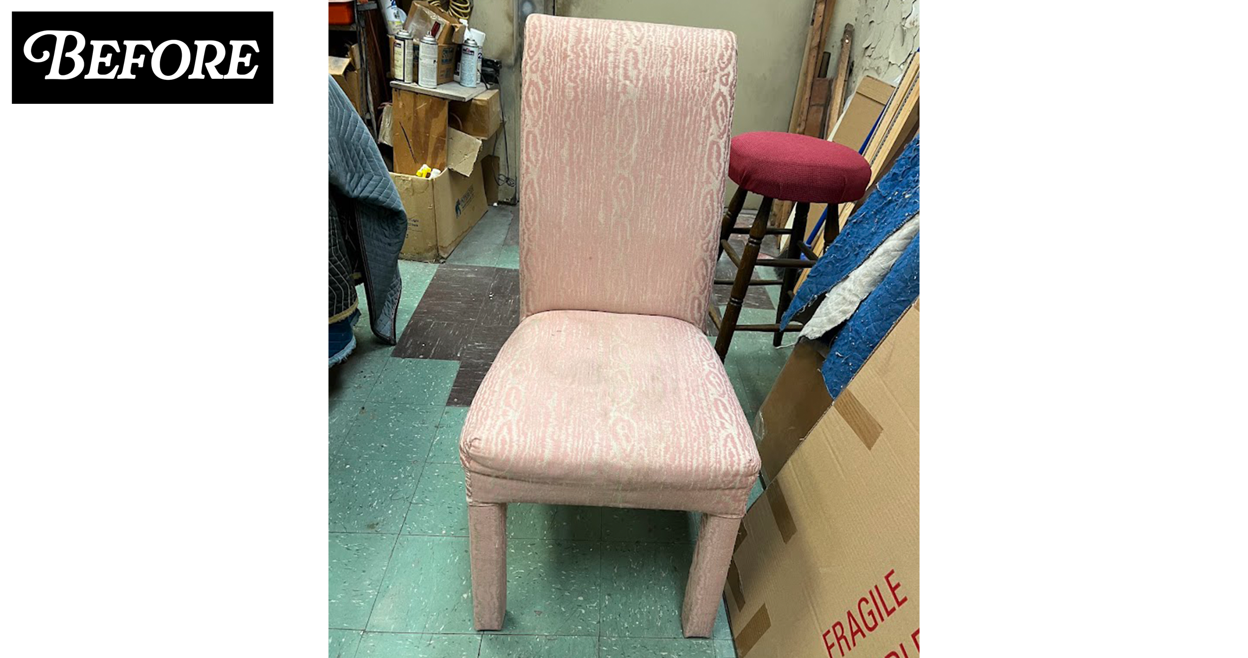 A pink upholstered chair with a high back and cushioned seat in a cluttered storage area, surrounded by boxes, furniture, and miscellaneous items.