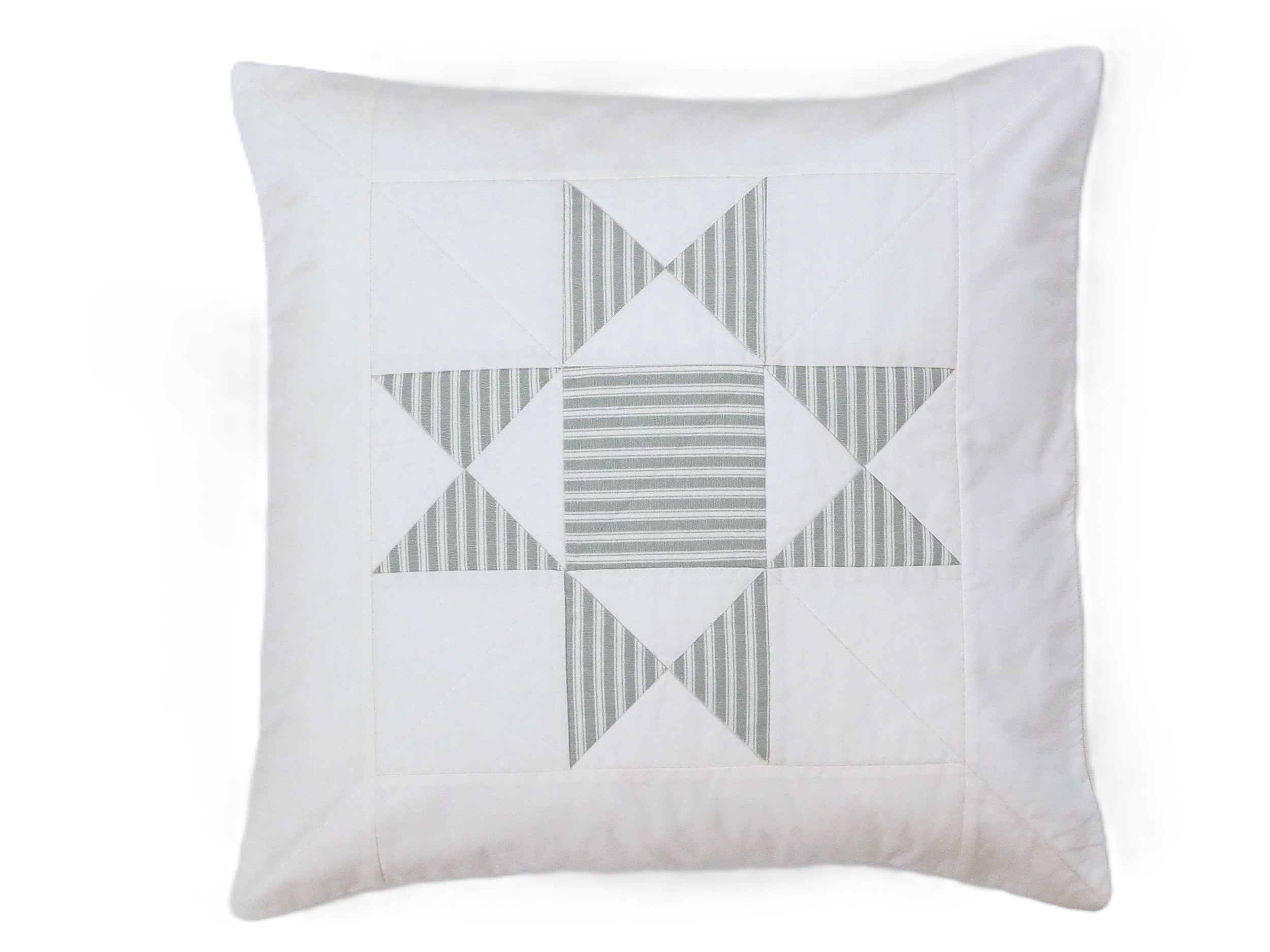 Close-up of natural cotton quilting stitches and ticking stripe fabric detail