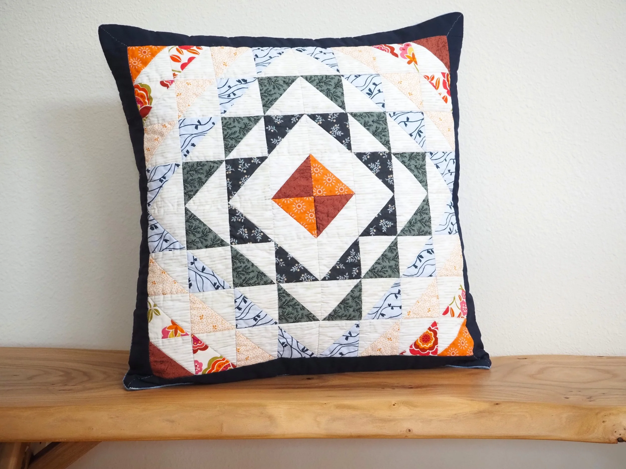 Handmade 18x18 Southwestern geometric arrow quilted patchwork pillow cover in blue teal green orange
