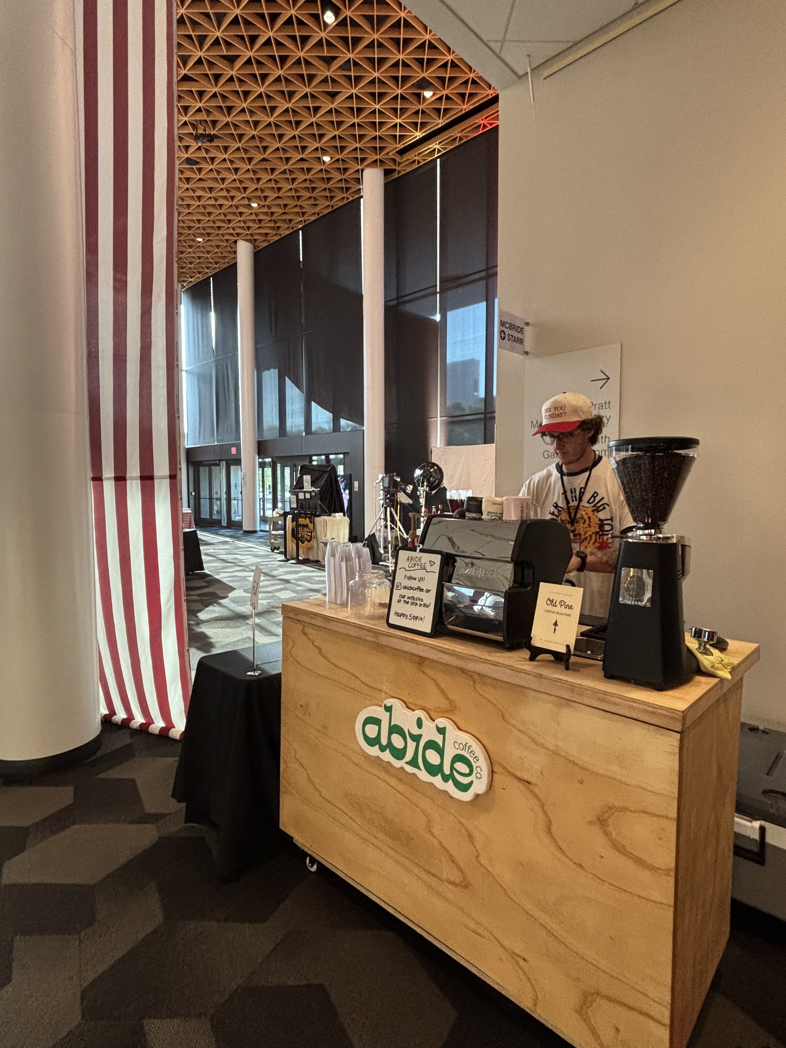 Specialty coffee cart setup delivering handcrafted lattes at private event