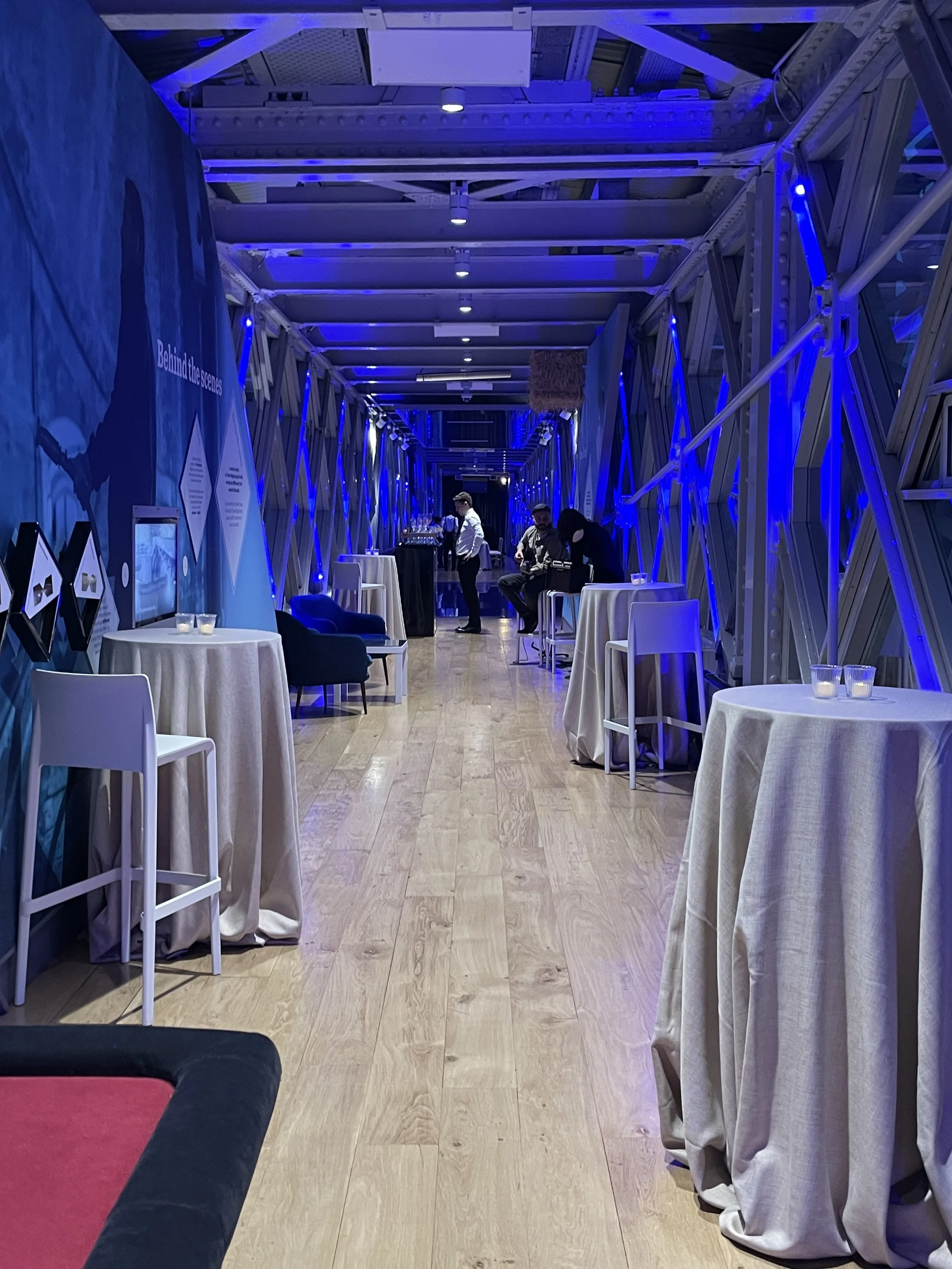 Blue-lit Tower Bridge walkway prepared for the evening