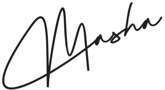 A close-up of a signature or handwritten text on a white background.