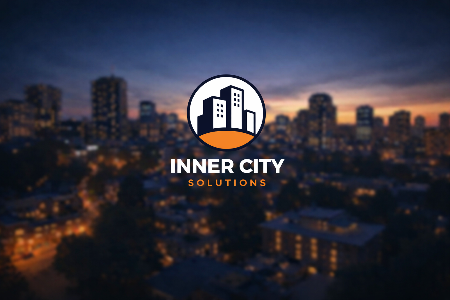 Inner City Solutions Logo over city evening background.