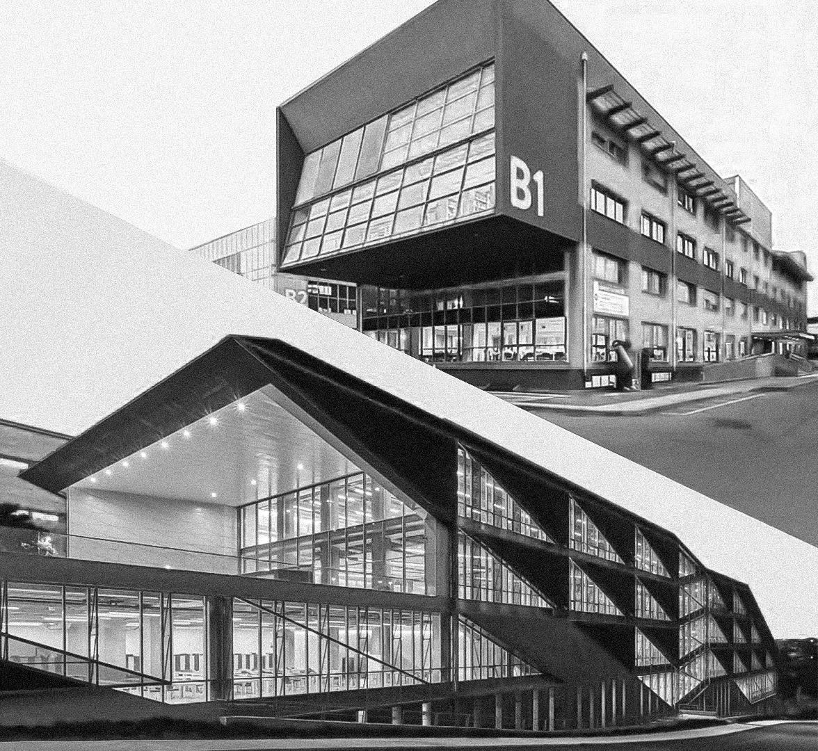 Black and white photo of modern office buildings with glass facades, one labeled B1 and the other with a prominent glass entrance.