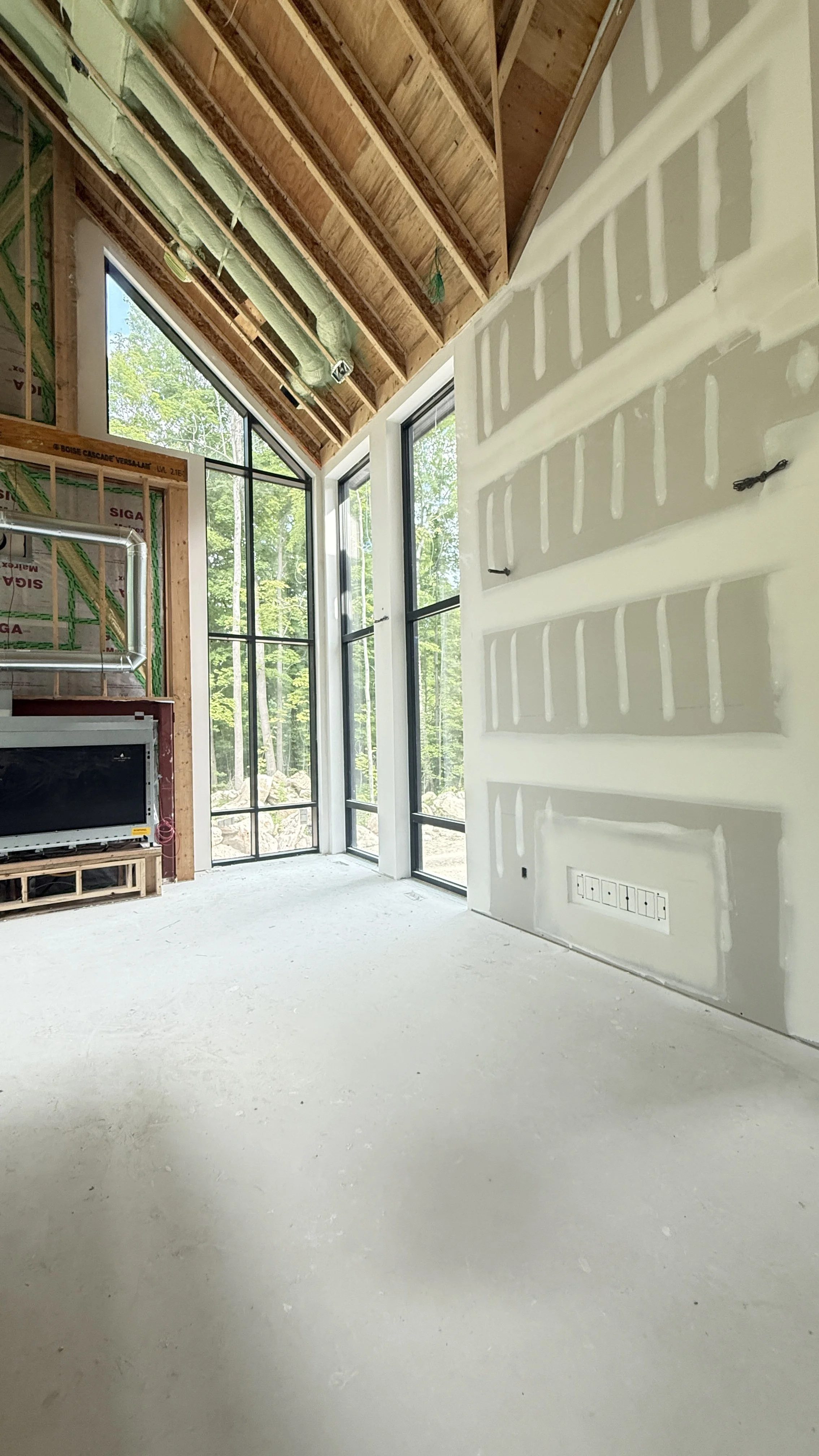 Tall ceilings modern drywall flush vents, mud in vents for modern drywall finish in florida custom home 