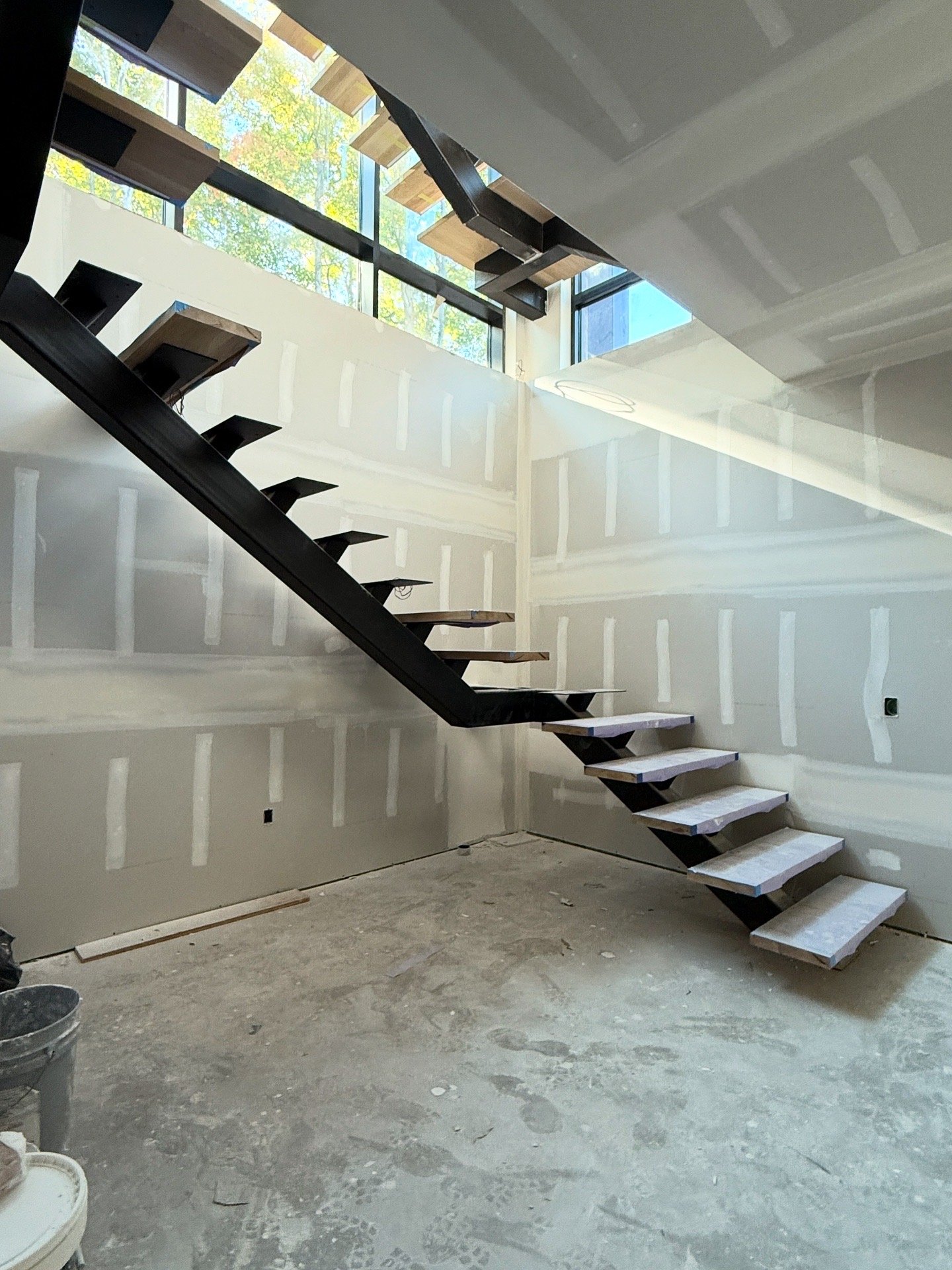 Open-concept high-end residential drywall installation in Florida