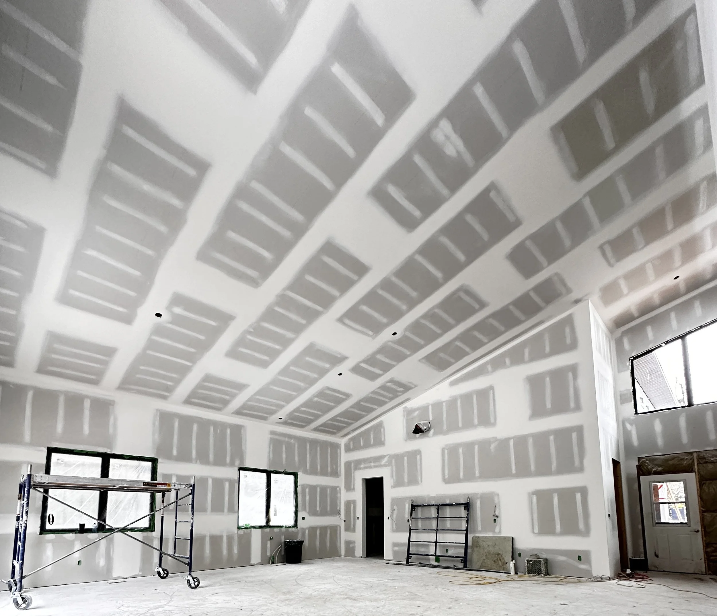 Drywall taping and mudding on high-end residential construction project in Florida