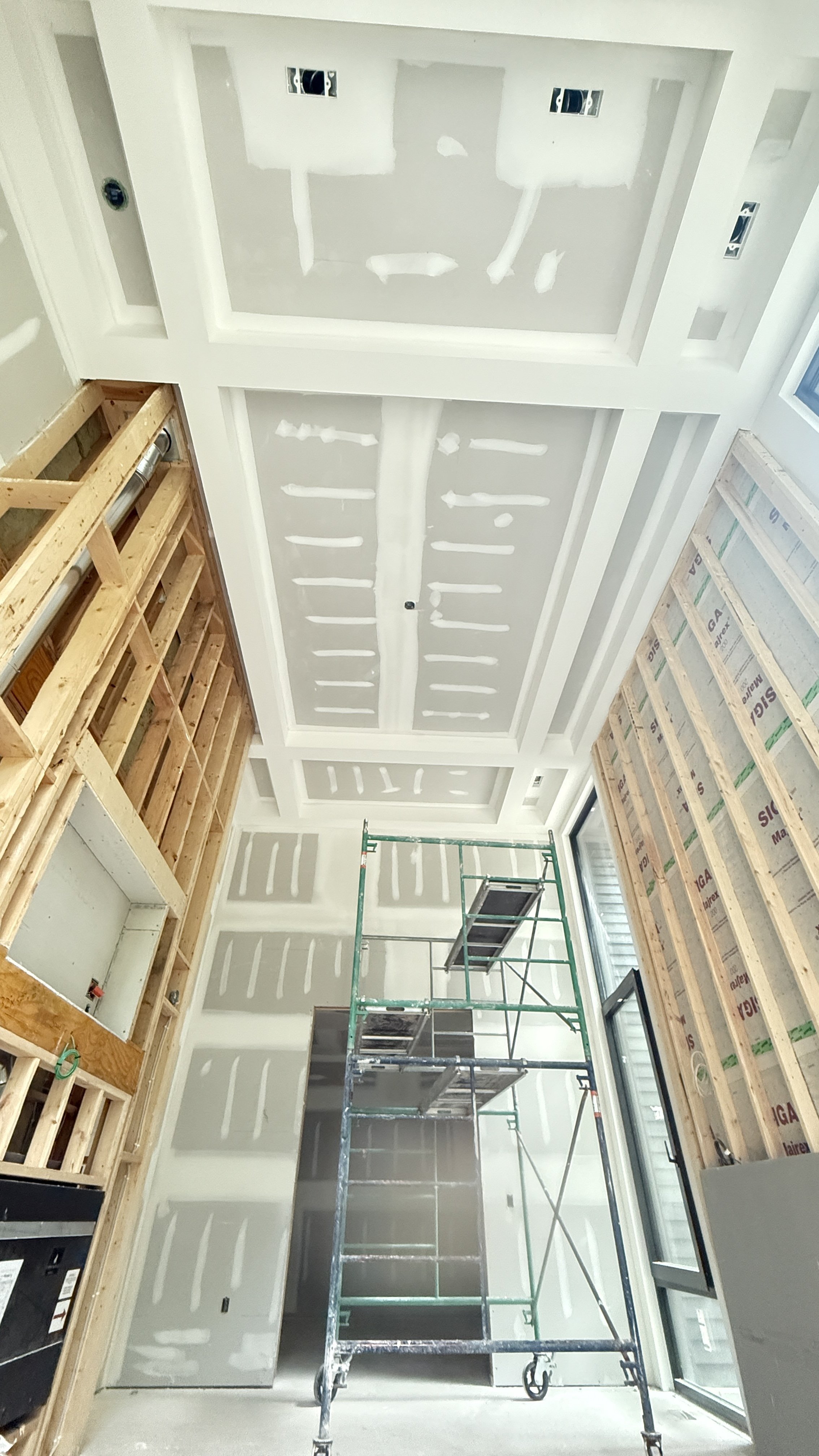 Coffered ceilings in modern custom home drywalled in florida 