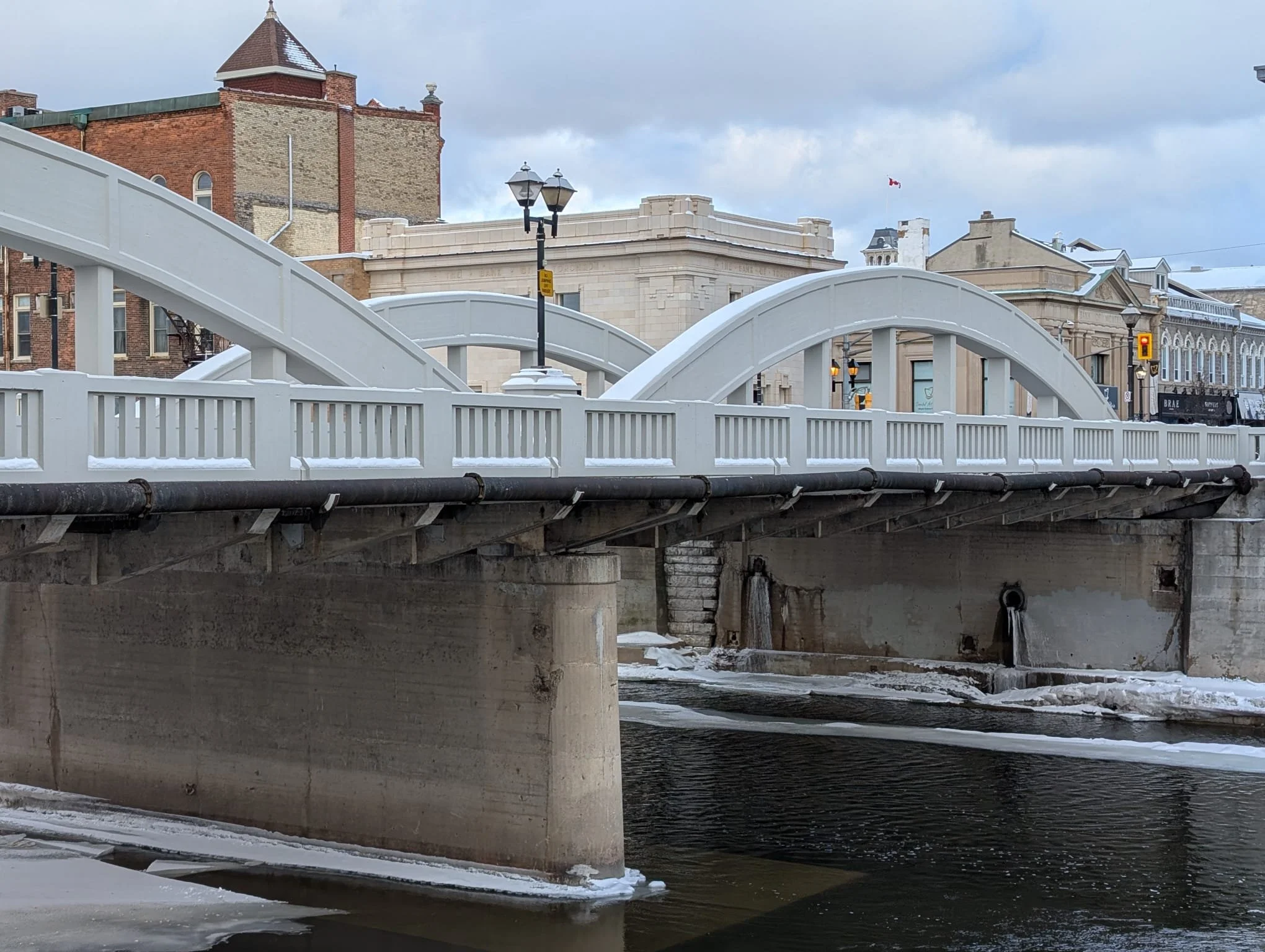 White arch bridge over the Grand River in downtown Galt, Cambridge, Ontario