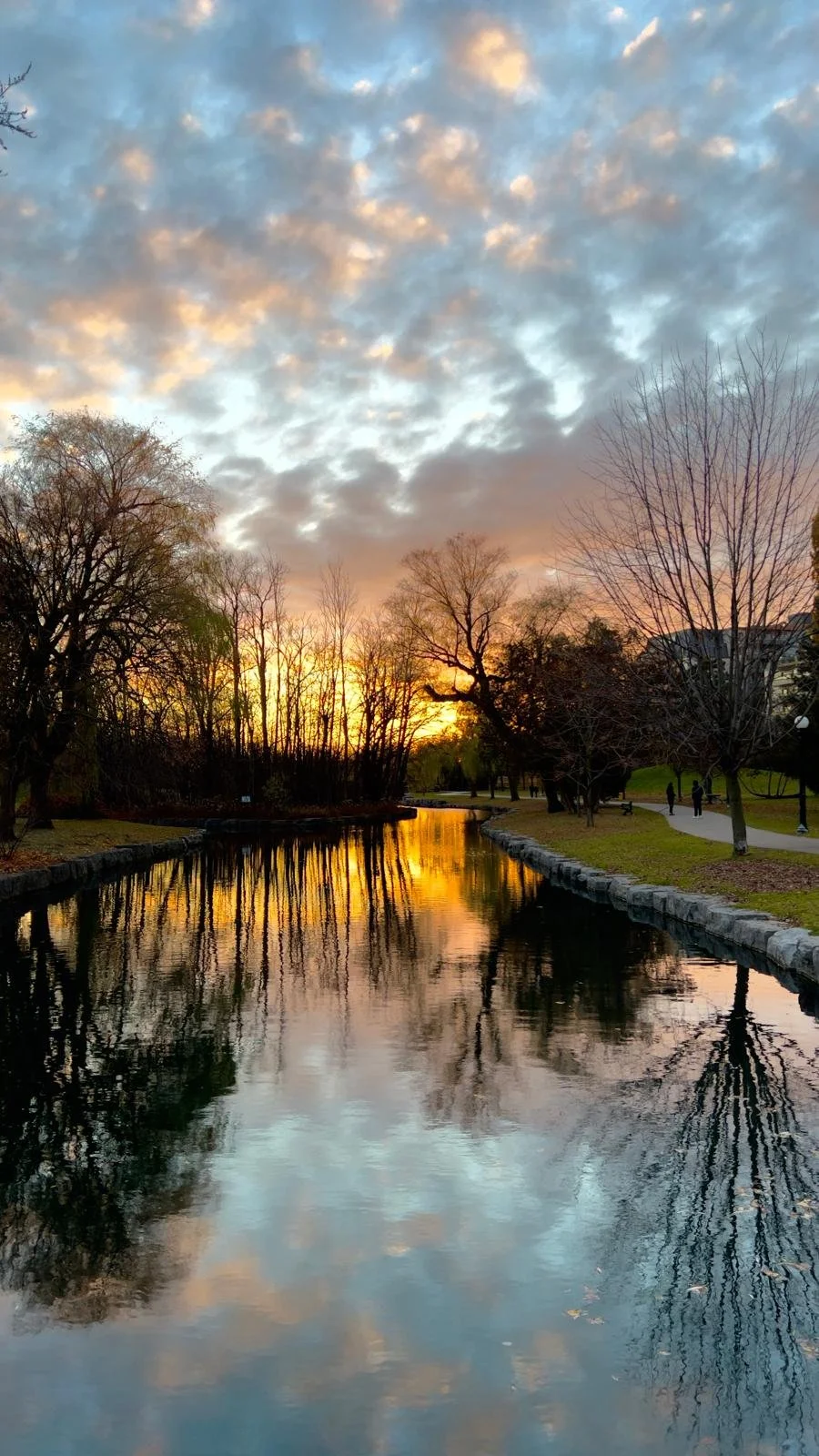Sunset reflection over the water at Victoria Park in Kitchener, Ontario