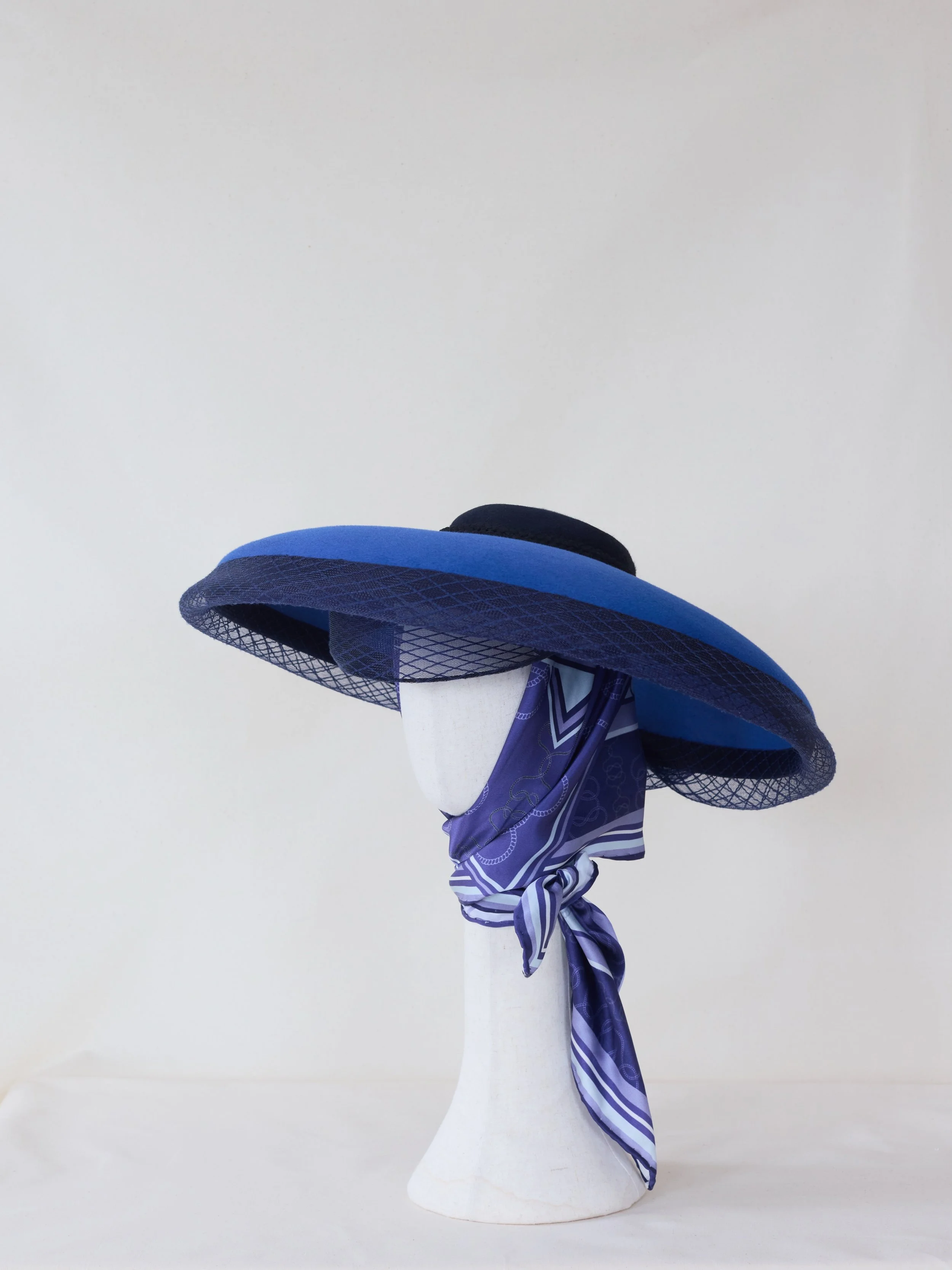 One of my hats from my final collection 🐎&ldquo;Tangled Tails&rdquo; 🐎 inspired by QEII wardrobe 

Imperial - This downward turned brim is a timeless style from the 1950s. I have added an equestrian touch to it. The lattice weave evokes the imagery