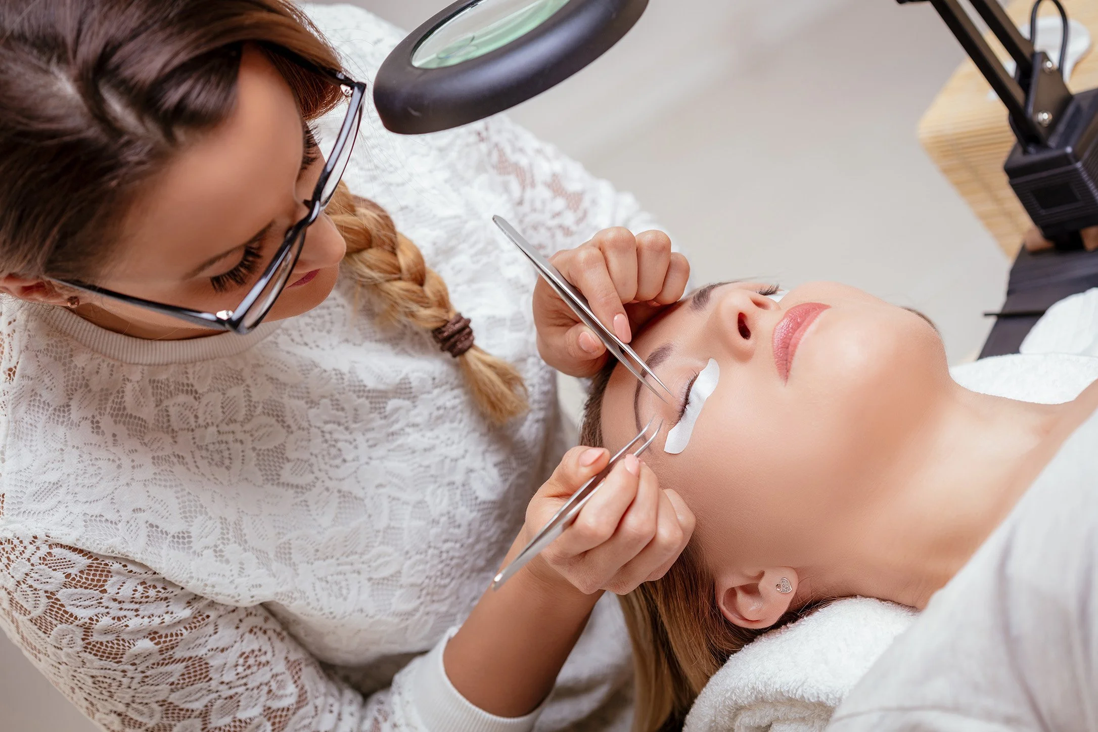 Professional volume eyelash extensions by Pink Élan Lash NYC, detailed lash application in a high-end lash studio