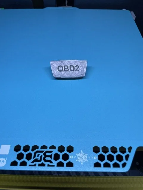 Universal OBD-II port cover