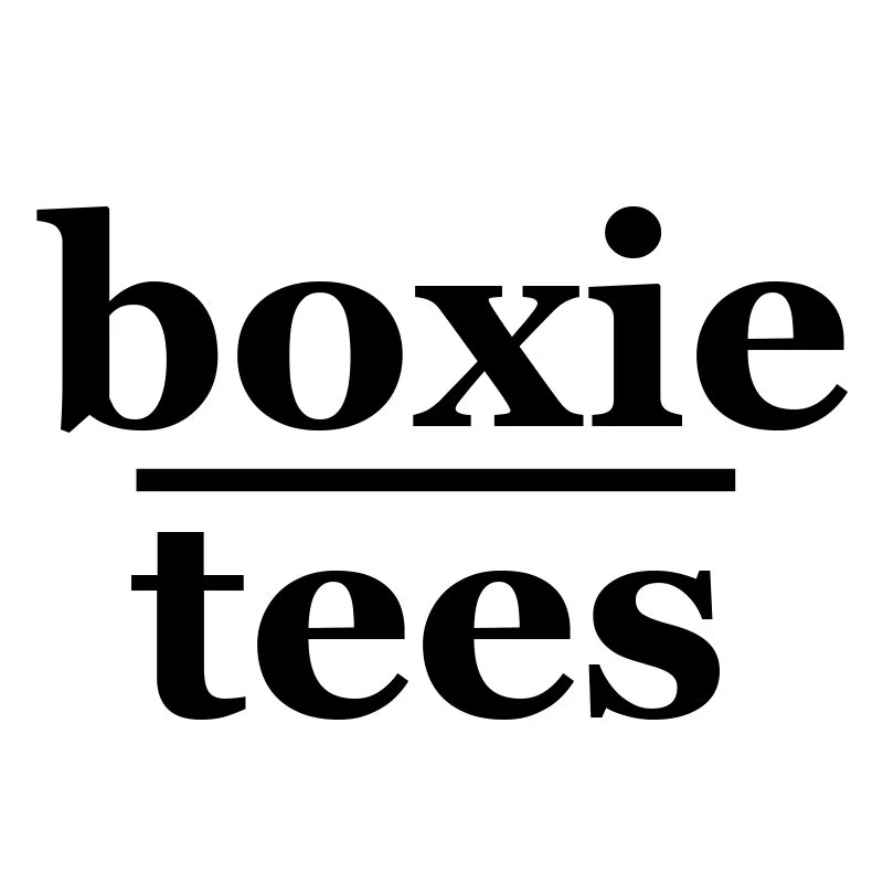 Black and white logo with the words "boxie" above "tees" separated by a horizontal line.