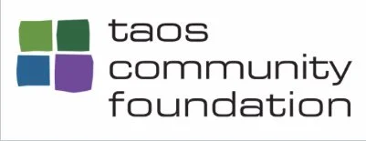 Taos Community Foundation logo with four colored squares and text