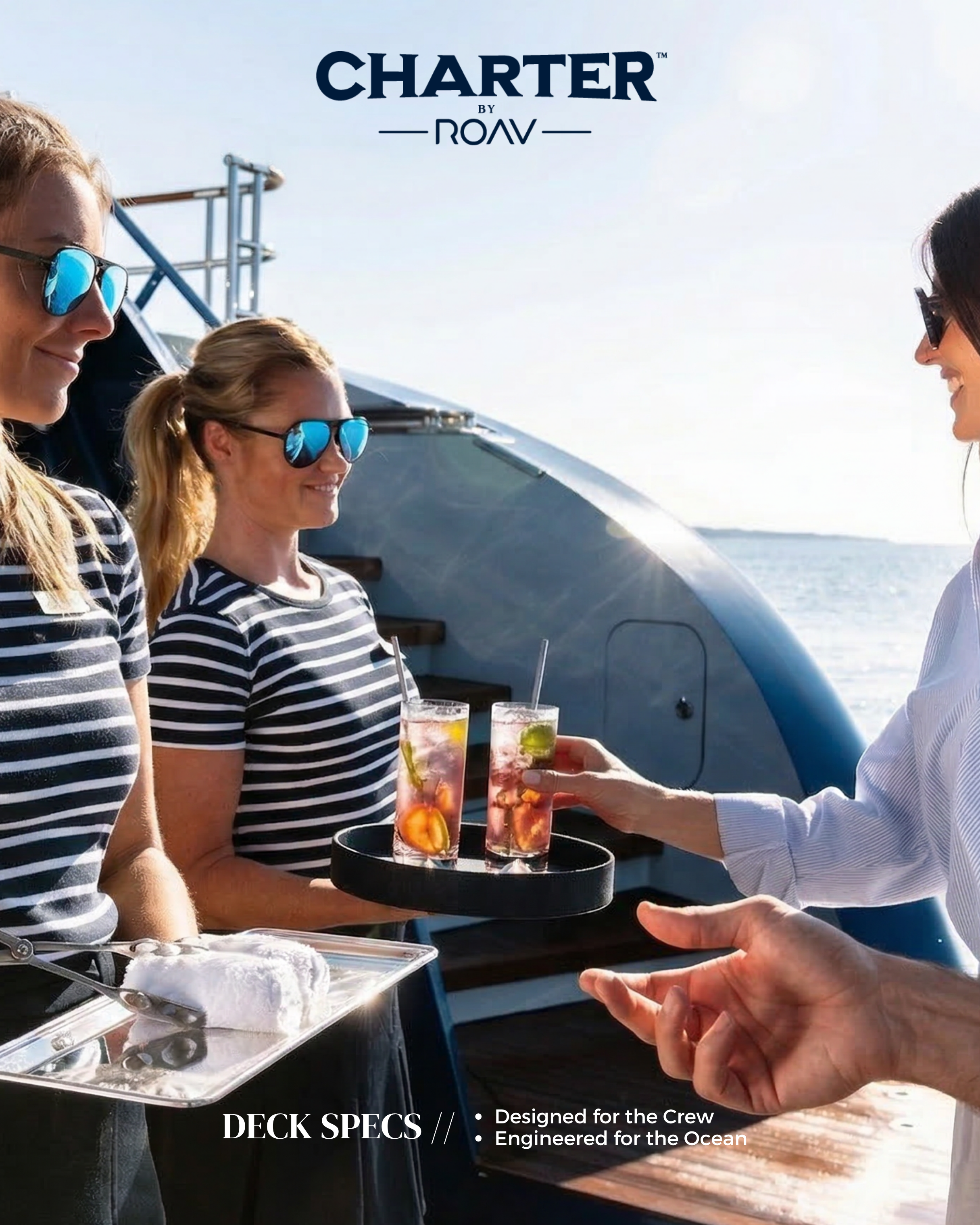 Close-up of three people on a boat, one woman serving drinks to another woman, wearing sunglasses and striped shirts, with a yacht and ocean in the background.