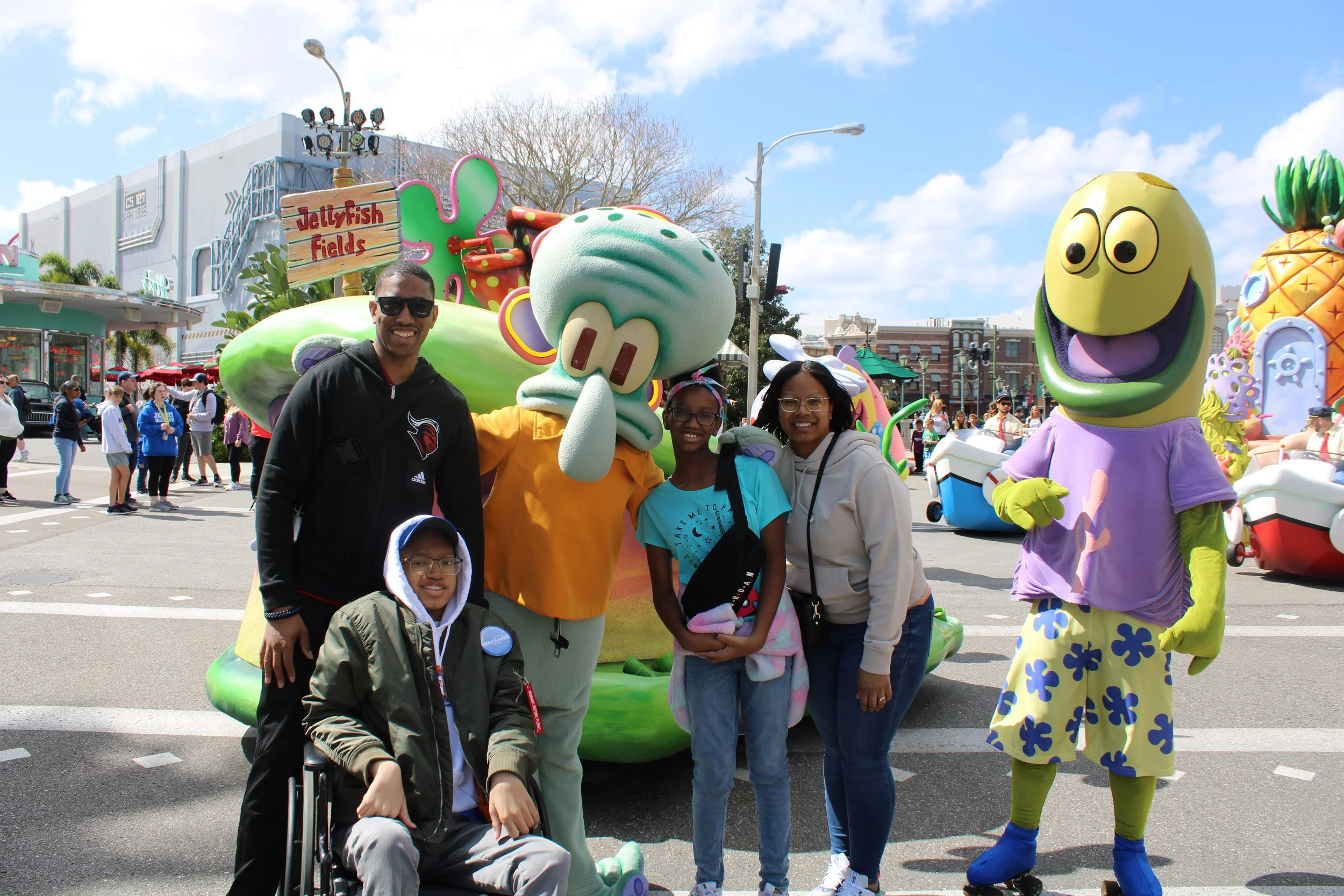 Travon with family at Disney World
