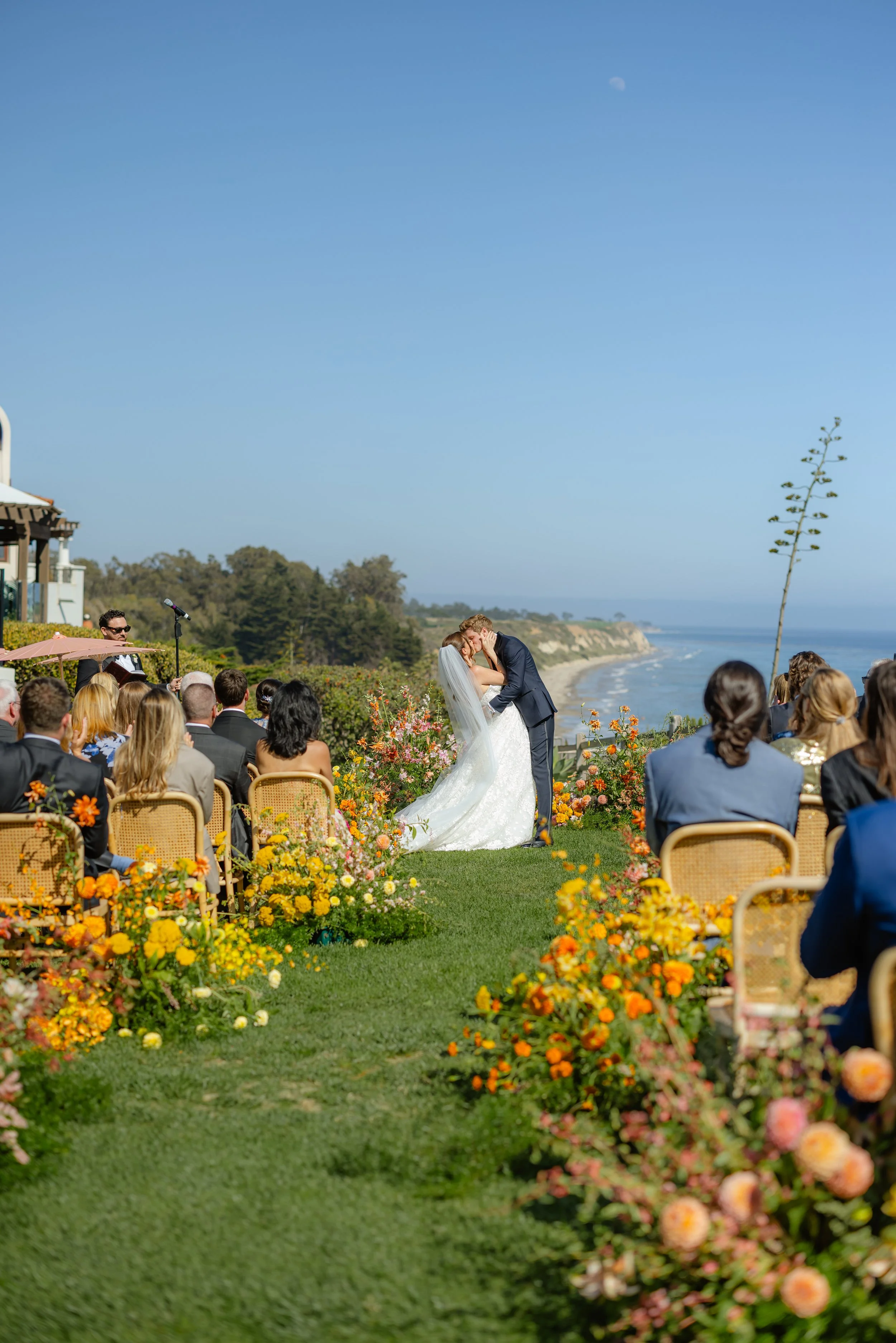 Summer wedding at the Ritz-Carlton Bacara Resort in Santa Barbara full of color