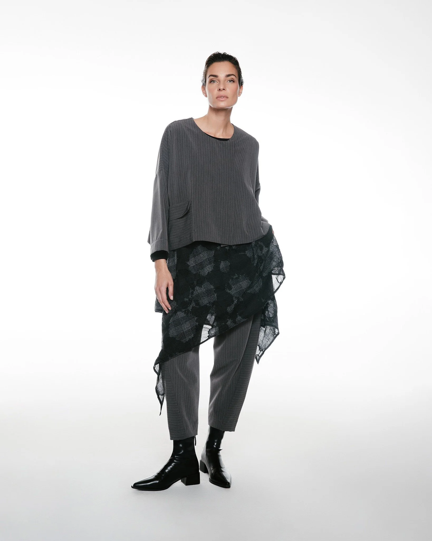 Featuring: Jacket Petunia

Jacket Petunia blends effortless comfort with bold, modern design. Crafted with a relaxed silhouette and rich textured fabric, it drapes beautifully while offering a distinctive architectural feel.

Paired with tailored tro