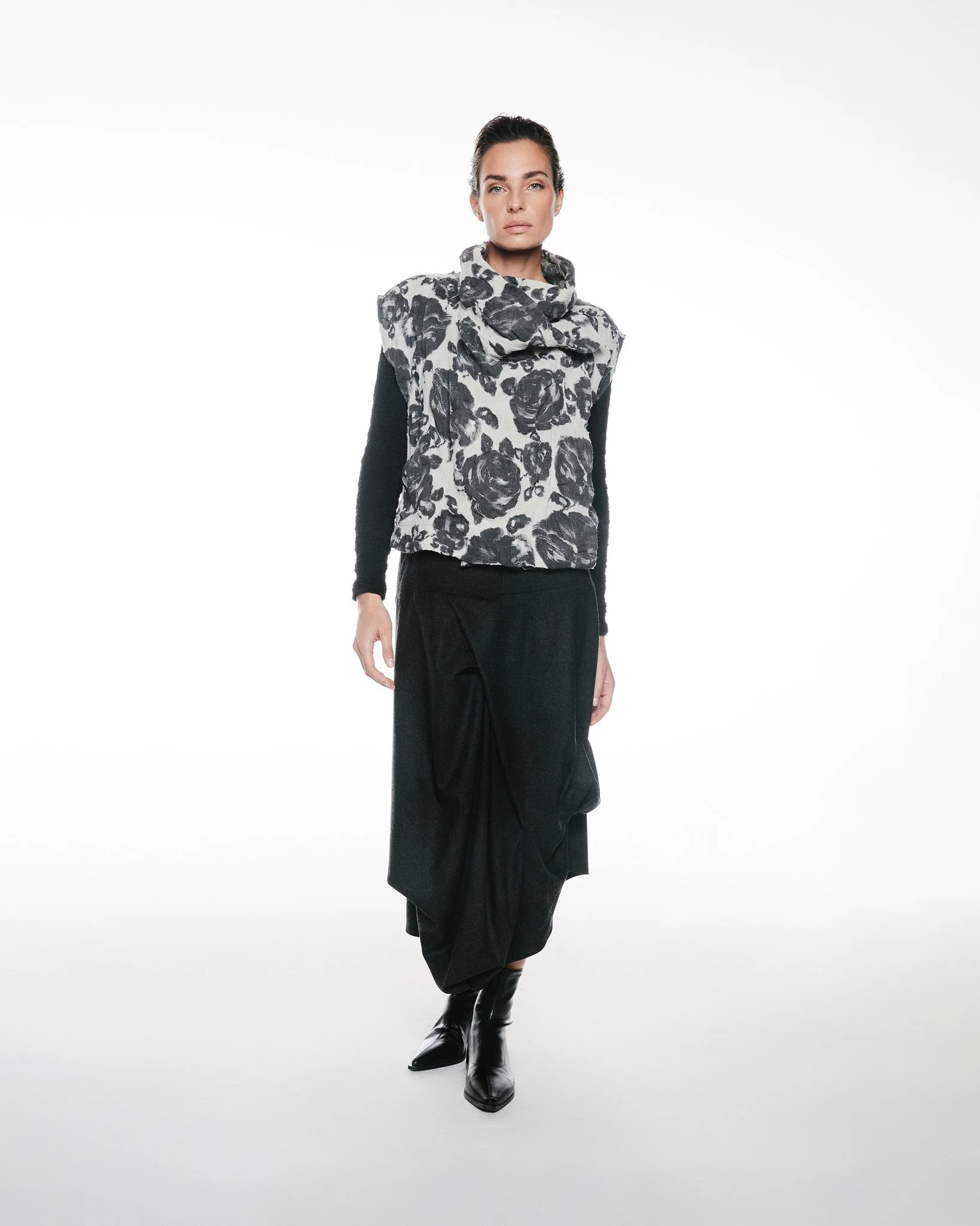 Featuring: W- Coat Heather

The sculptural neckline, bold monochrome floral, and modern boxy cut create instant presence without sacrificing comfort.

For your customer: this is her &ldquo;I want to look elevated without overthinking it&rdquo; piece.