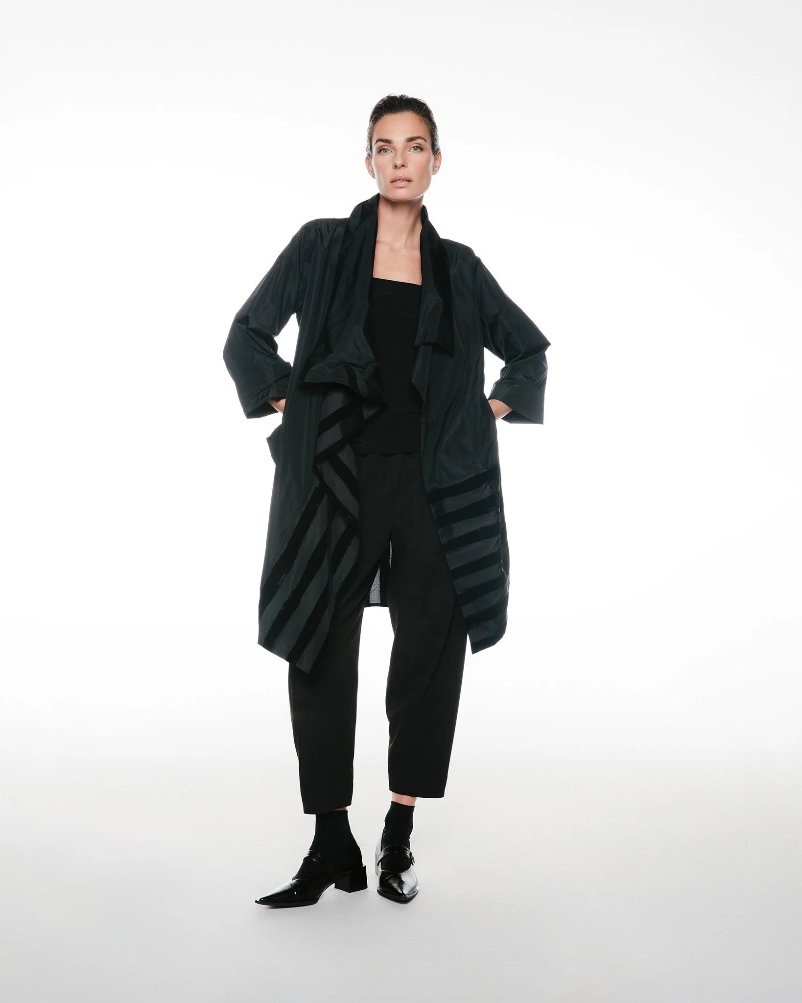 Featuring: Tunic Mandevilla

This is quiet drama at its best. The fluid silhouette paired with subtle texture creates movement without effort&mdash;polished, but never stiff.

For your customer: this is her elevated everyday piece. She throws it over