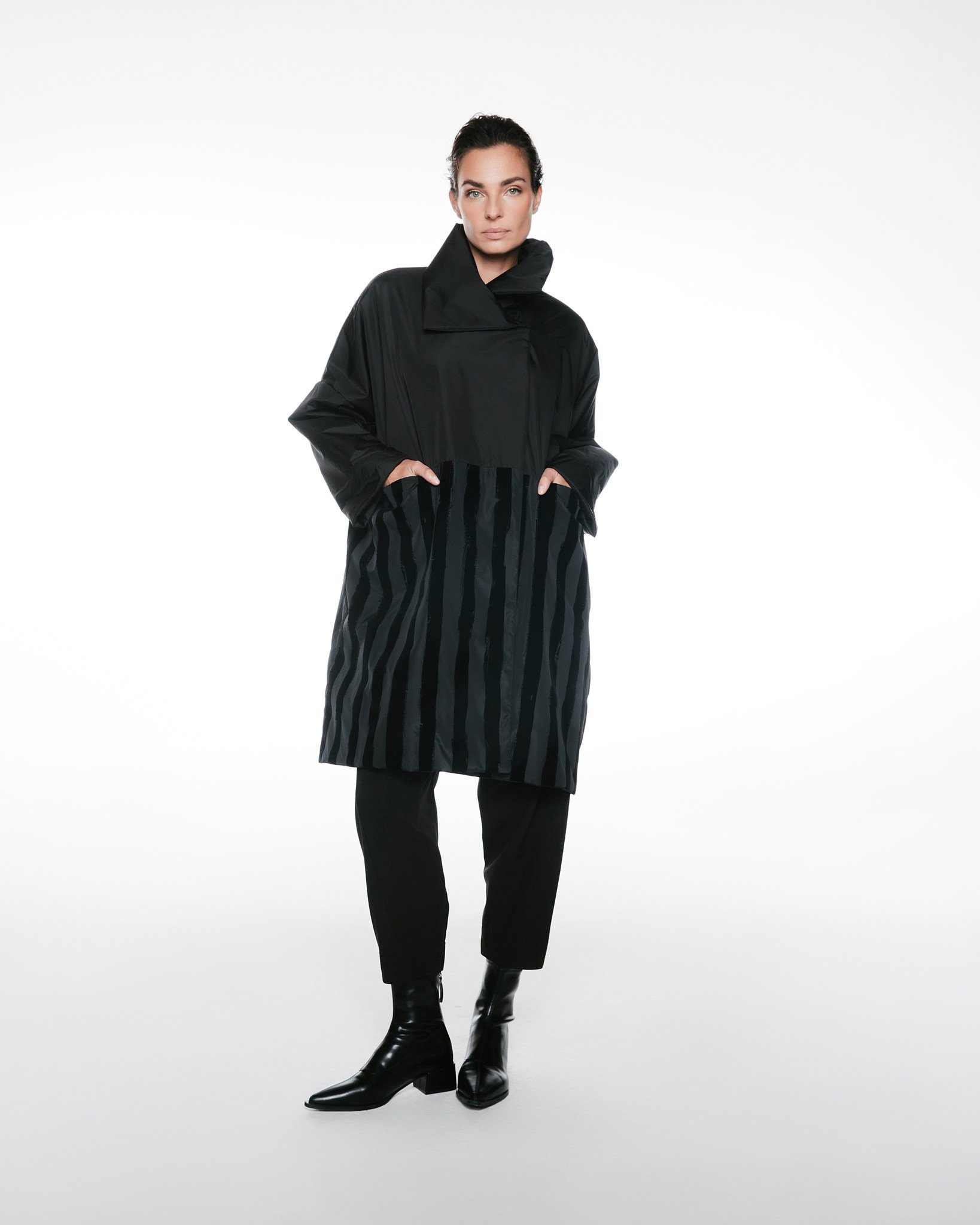 Featuring: Coat Holly

This is the coat that stops traffic. The bold vertical texture, oversized silhouette, and sculptural collar create instant presence.

For your customer: this is her &ldquo;main character&rdquo; coat. The one she reaches for whe