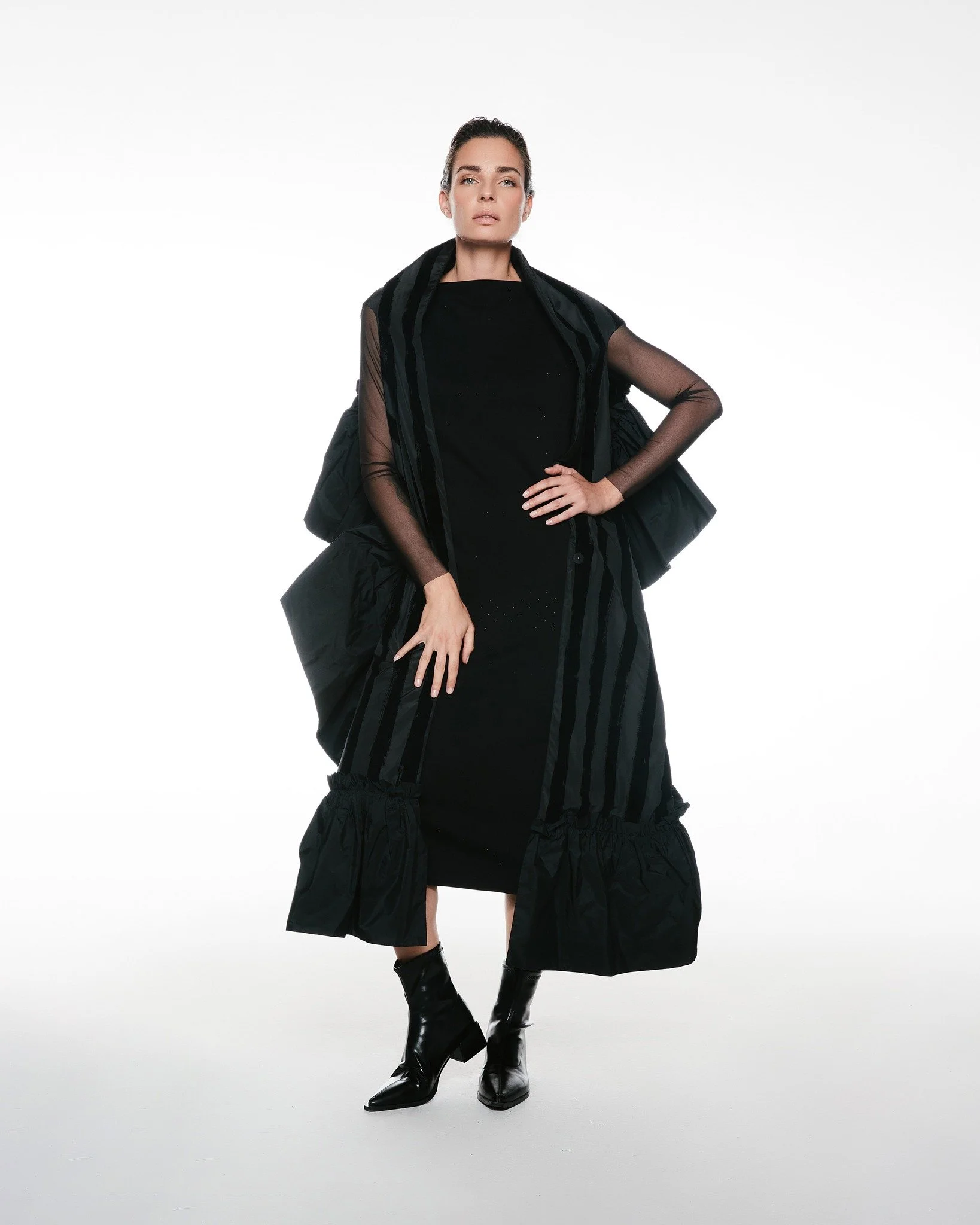 Featuring: Scarf + W-Coat Ash

This is elevated layering done right. The built-in scarf detail and dramatic volume create a luxurious, wrapped-in-confidence feel.

For your customer: this is her investment piece. Effortless, chic, and versatile&mdash