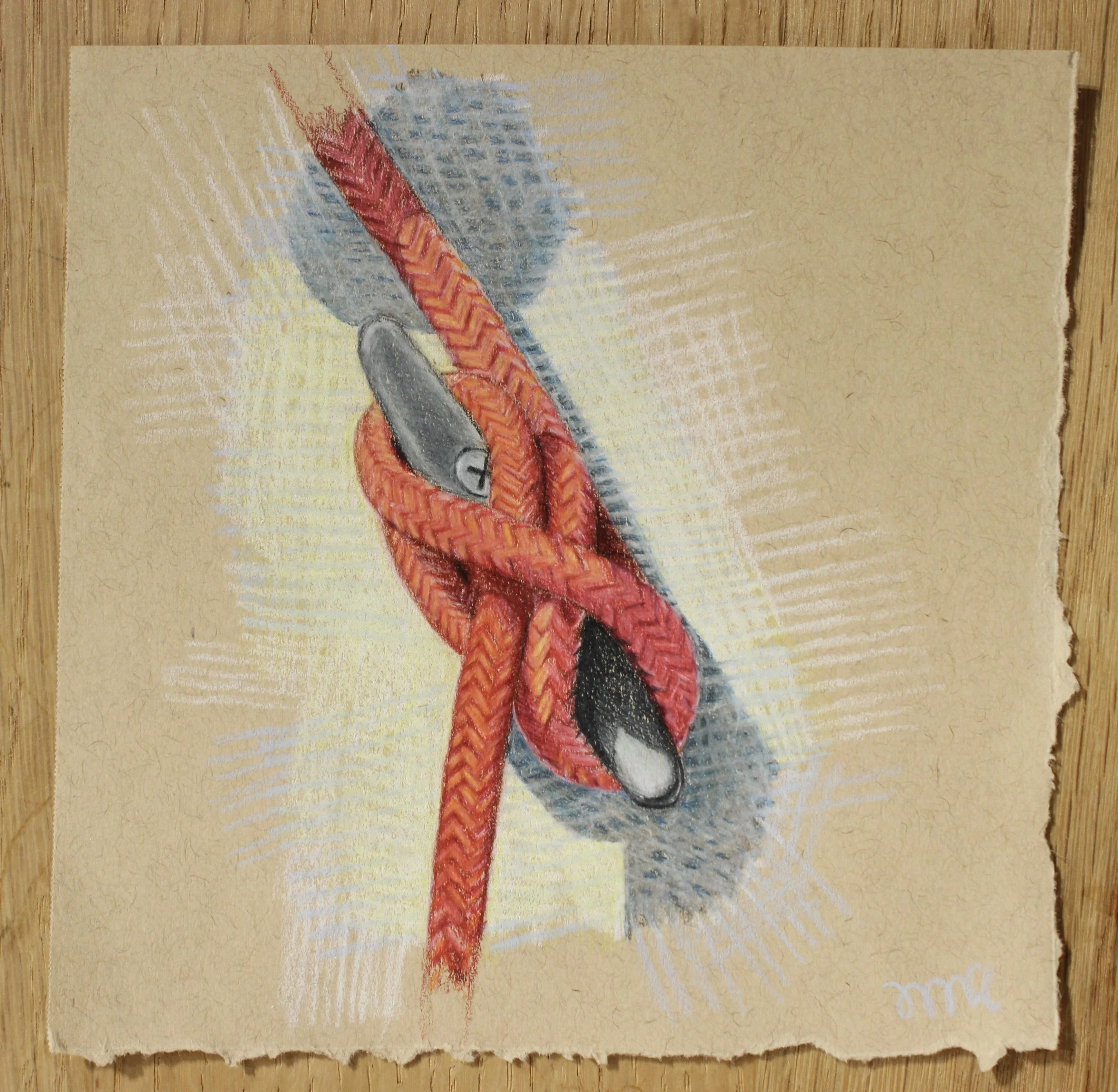 Colored pencil drawing of a red and orange rope, with two black and white fishing floats, on a textured tan paper background.