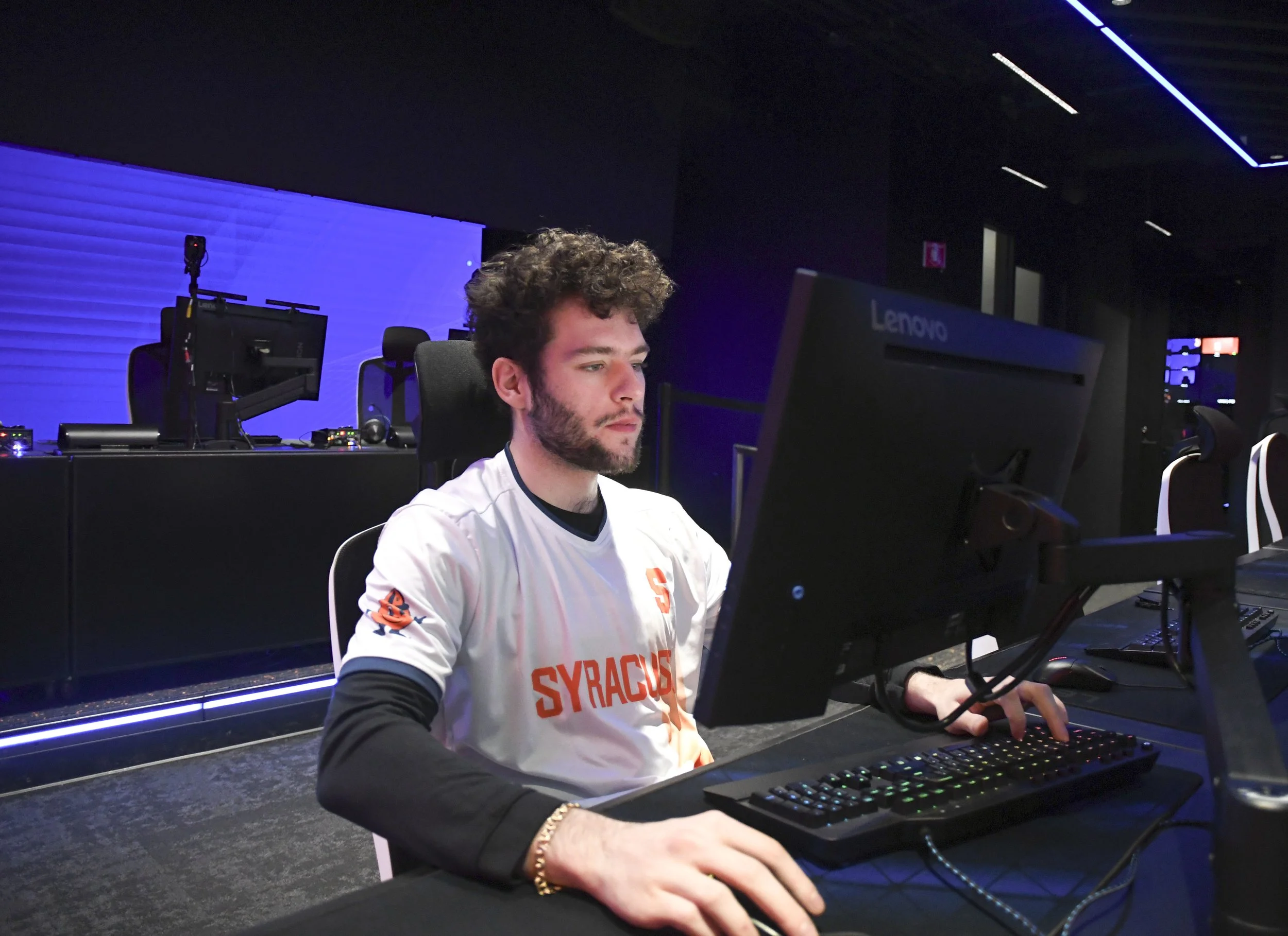 Anthony Solt sits at his gaming desk