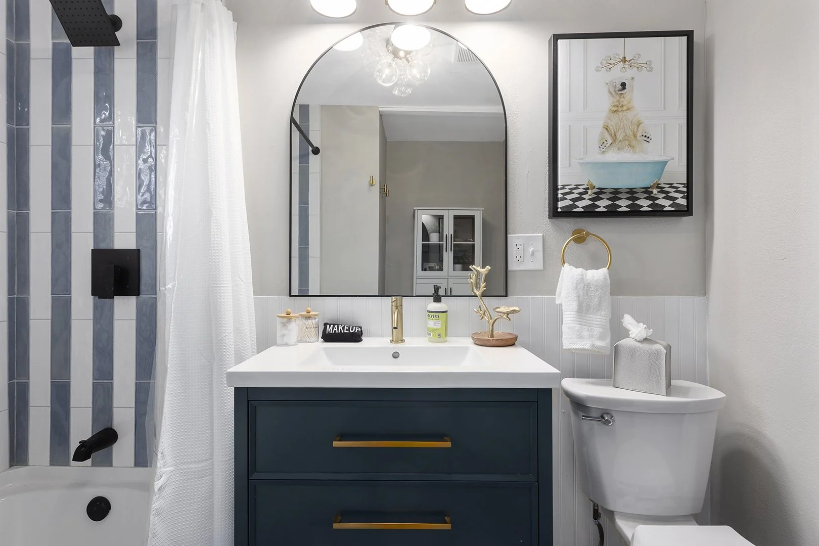 Modern bathroom with blue vanity
