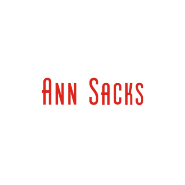 Logo with red text that reads "Ann Sacks" on a white background.