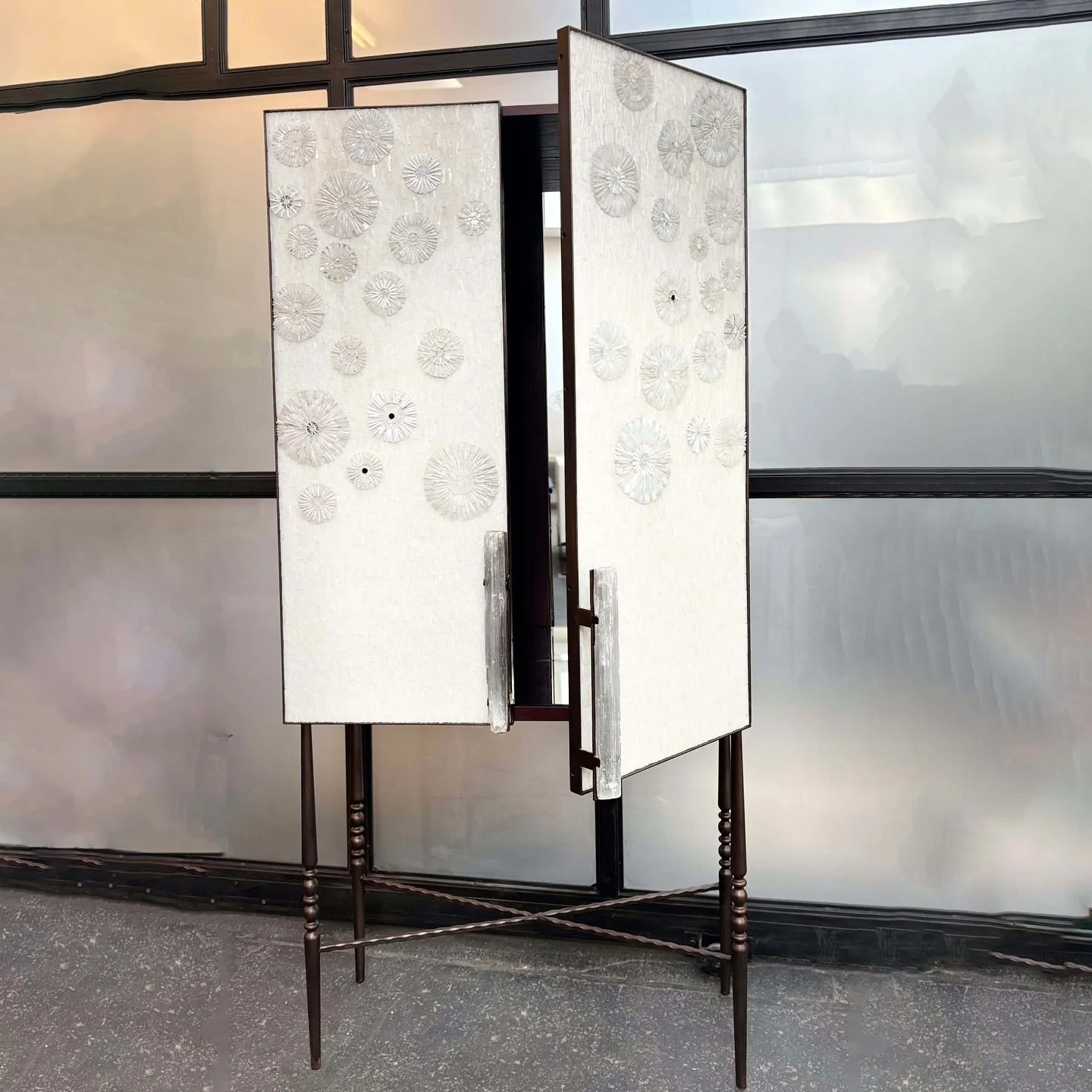 Blossom dry bar cabinet with selenite handles, icy white mix glass mosaic, a Birnjal finish case, and Vintage Base.

Handmade for @bonniejstevesinteriordesign