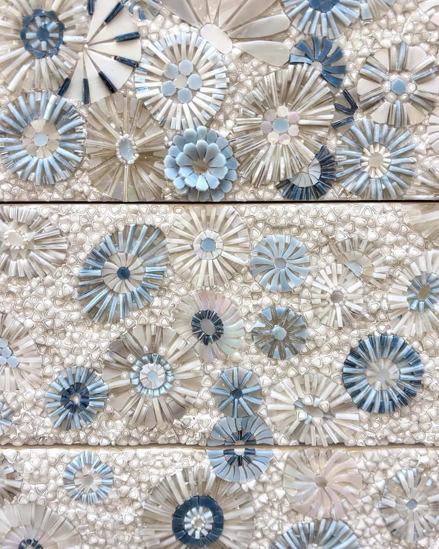 floating chest of six drawers with hand-cut glass mosaic in wildflower blossom pattern in shades of white and blue for @eliecrocettifraioli