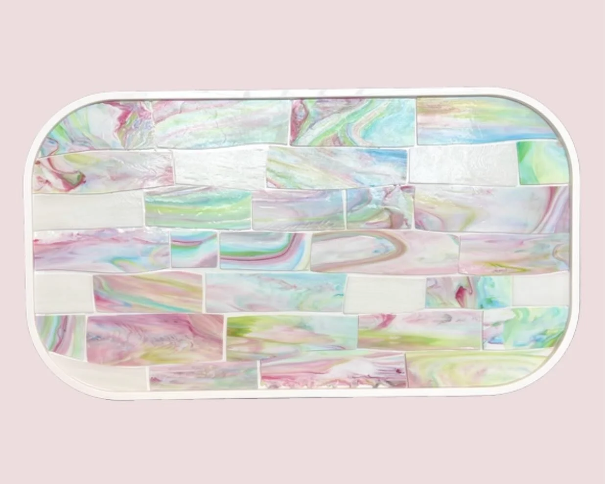 New for summer, a pastel palette of glass on Ercole&rsquo;s classic coffee table