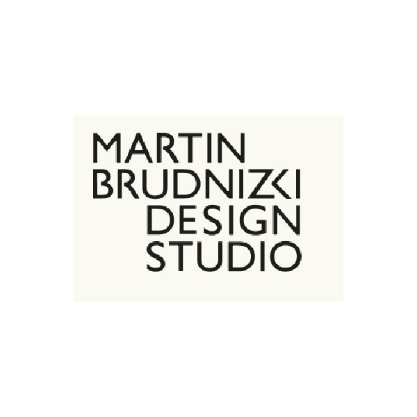 Logo for Martin Brudnizki Design Studio with bold black text on a light background.