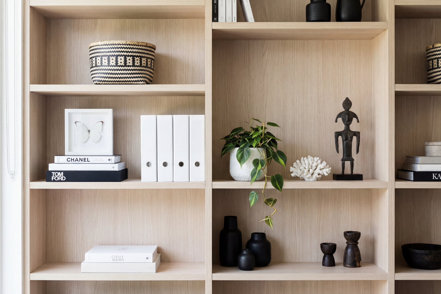 Bookcase styling with greenery