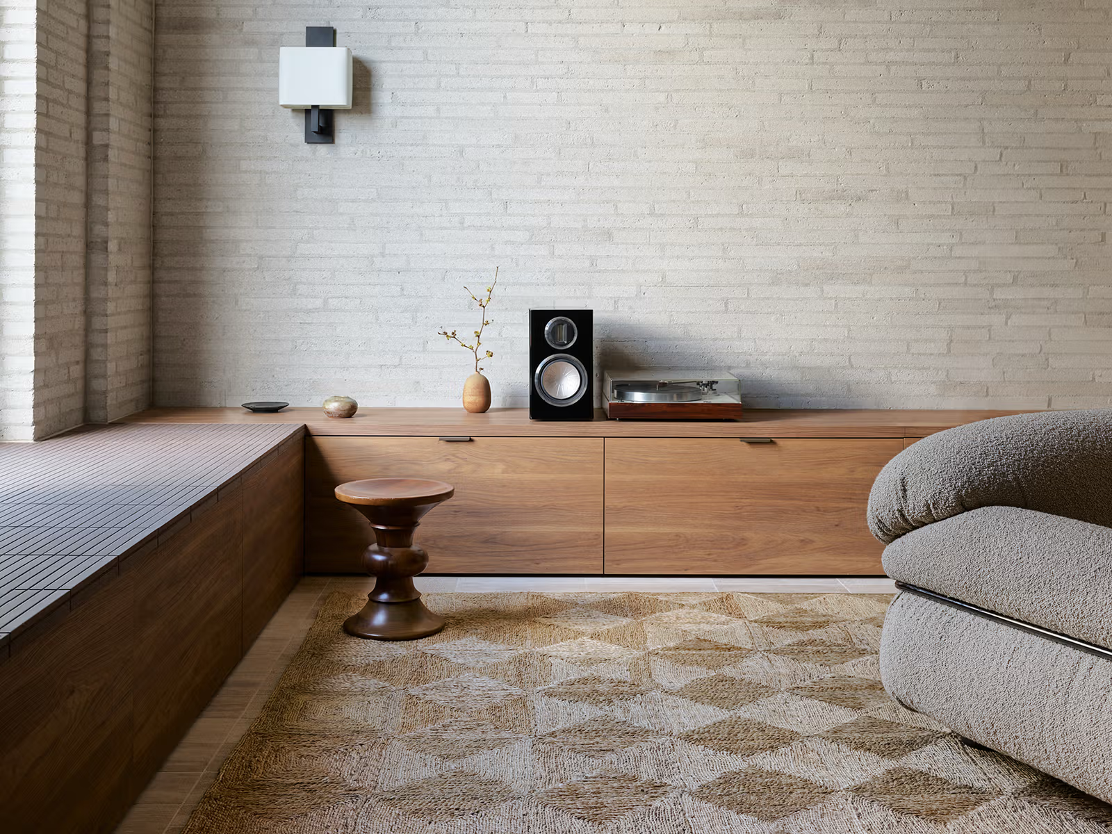 Sequoia jute rug by Armadillo & Co in a modern living room with warm timber cabinetry