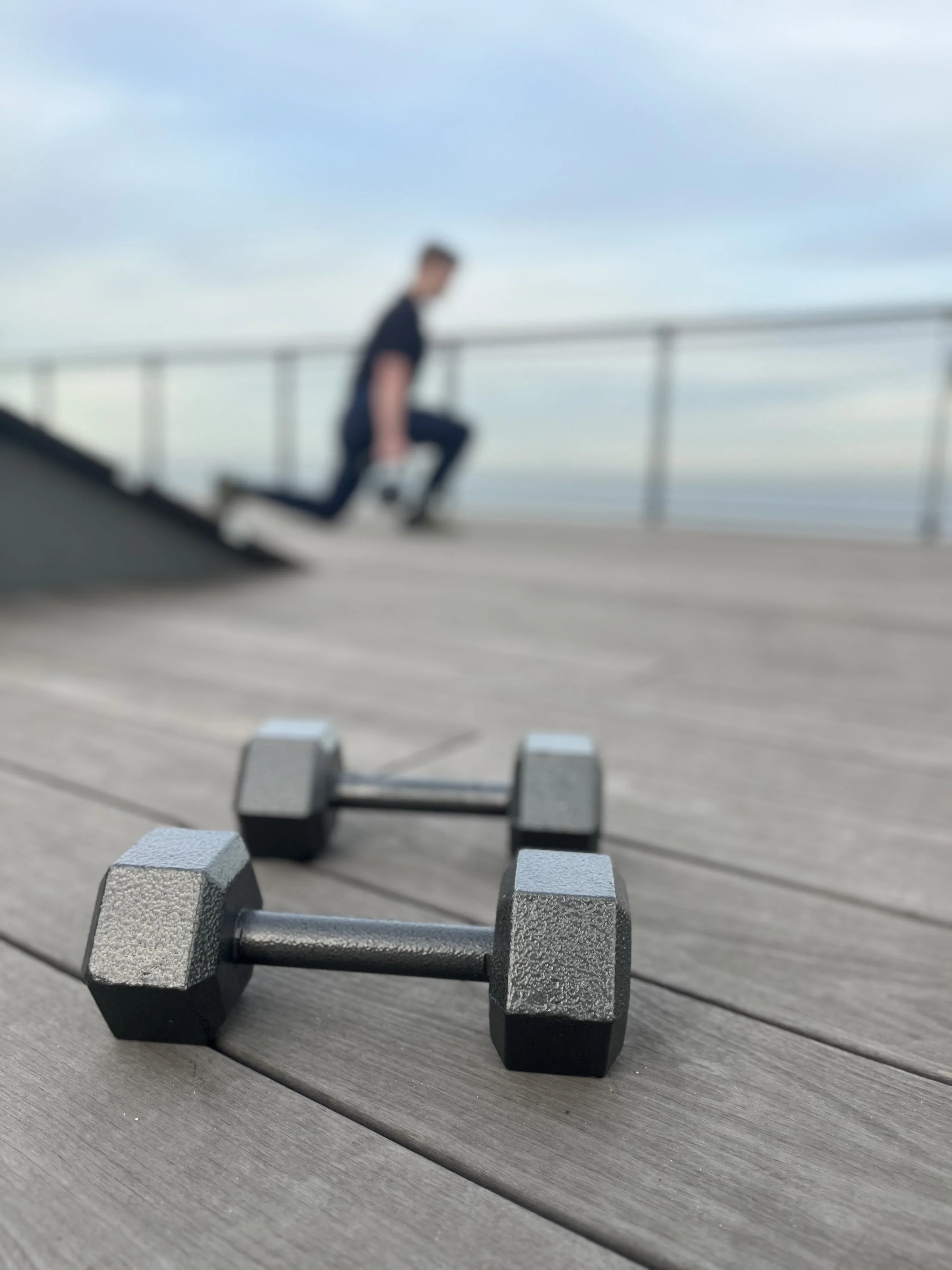 Person performing lunges during personal training session at the Meta campus in Burlingame.