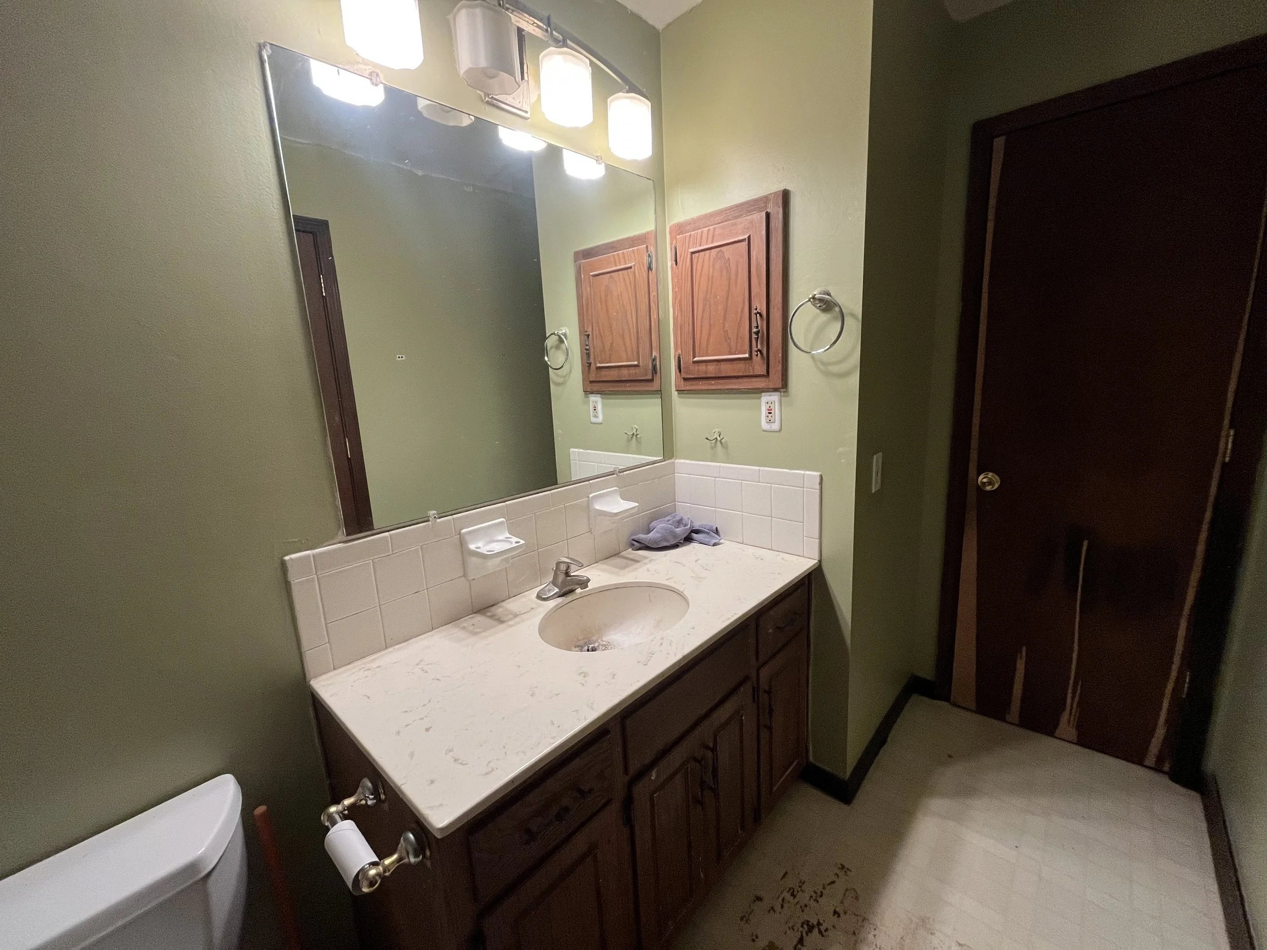 Bathroom, hallway closet taking up space (before)