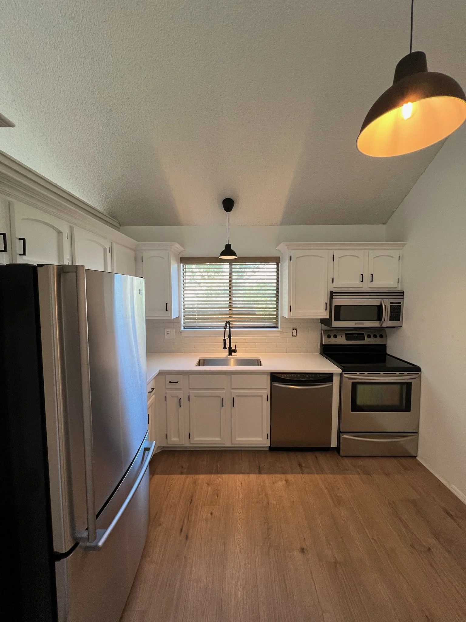 Kitchen remodel, new flooring, countertop & hardware (after)