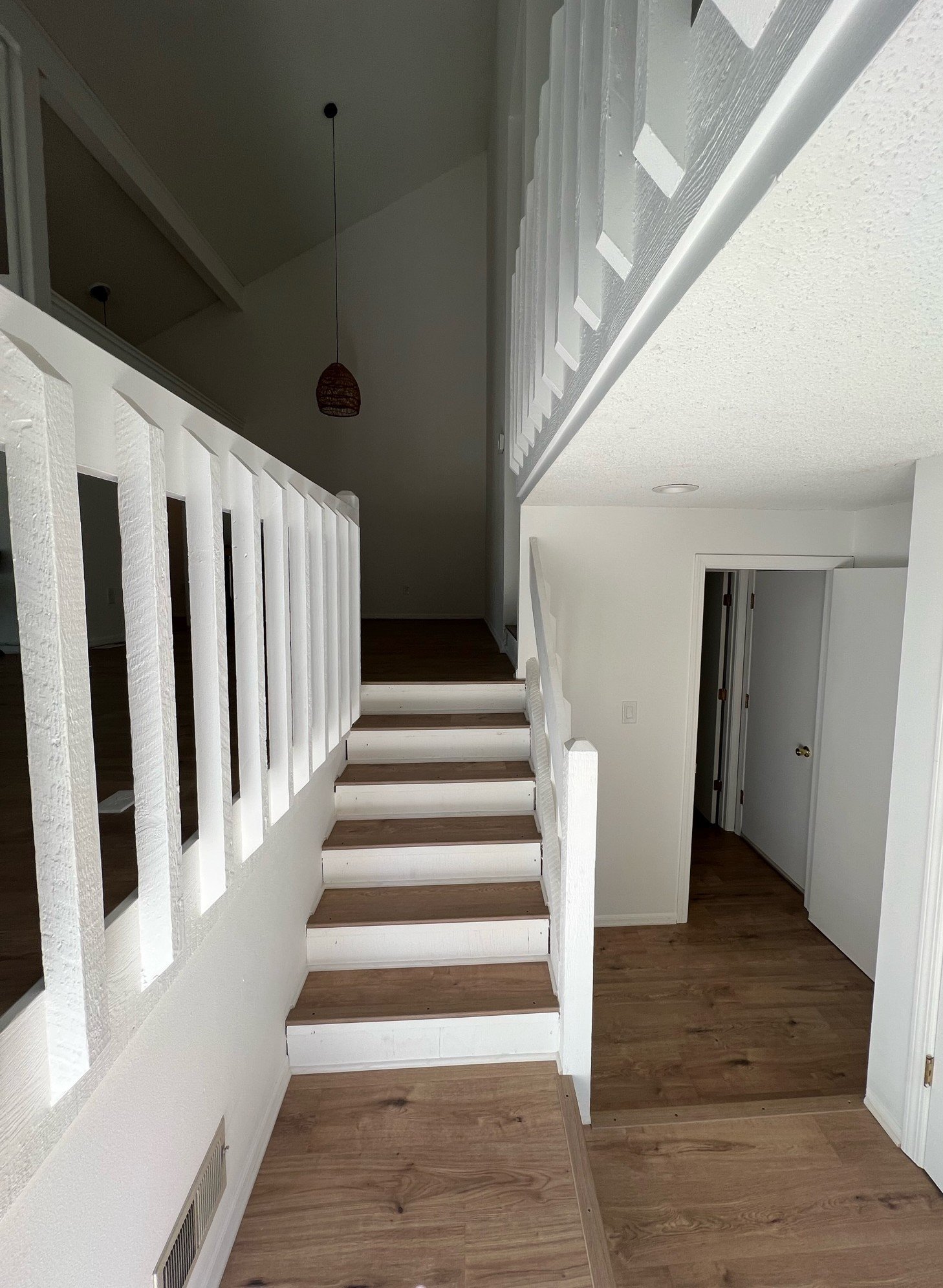 Staircase, engineered hardwood (after)