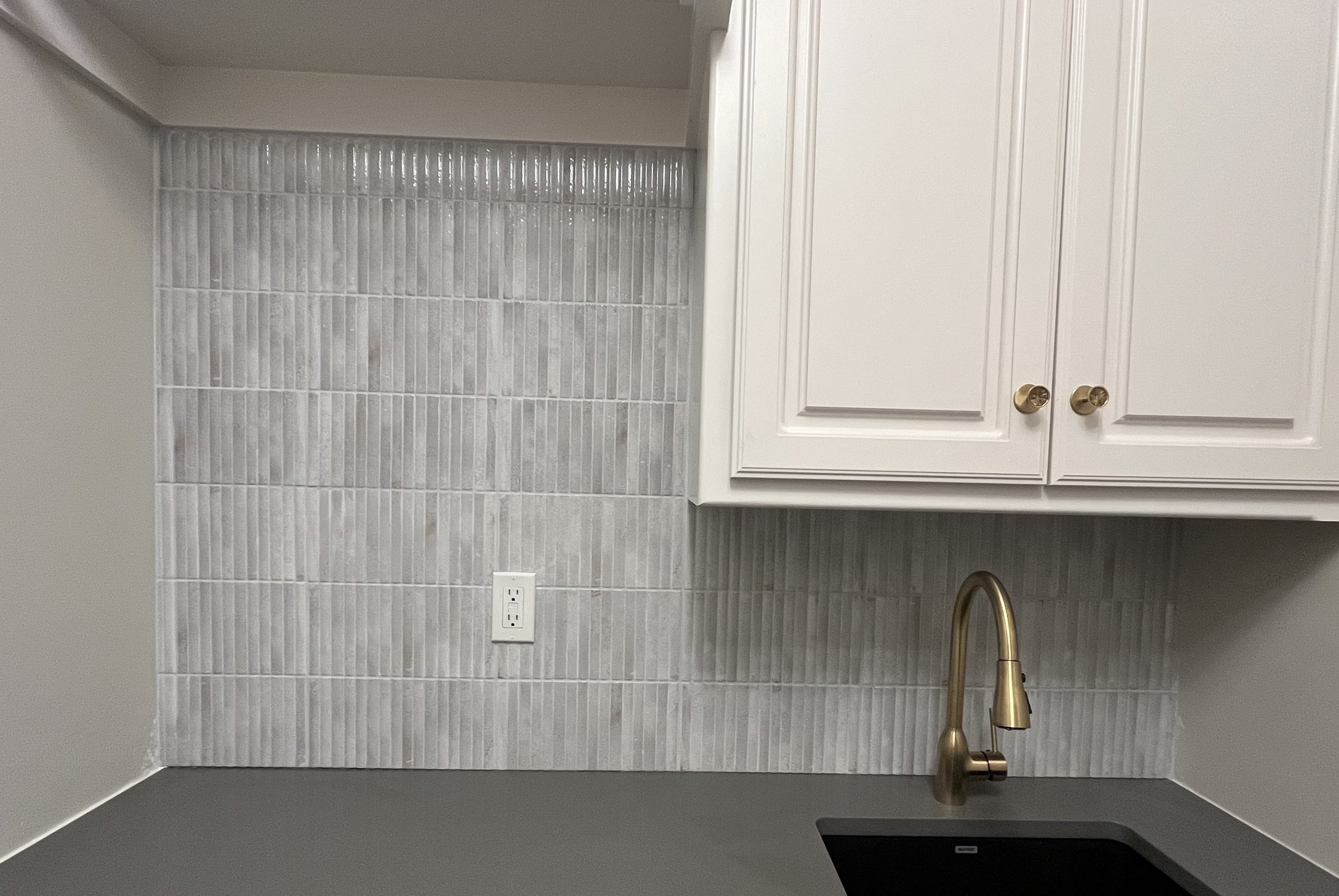 Laundry room sink, backsplash installed (after)