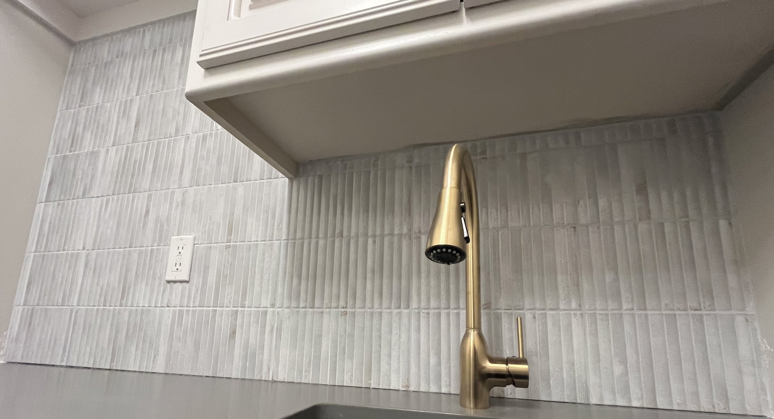 Laundry room sink, backsplash installed (after)