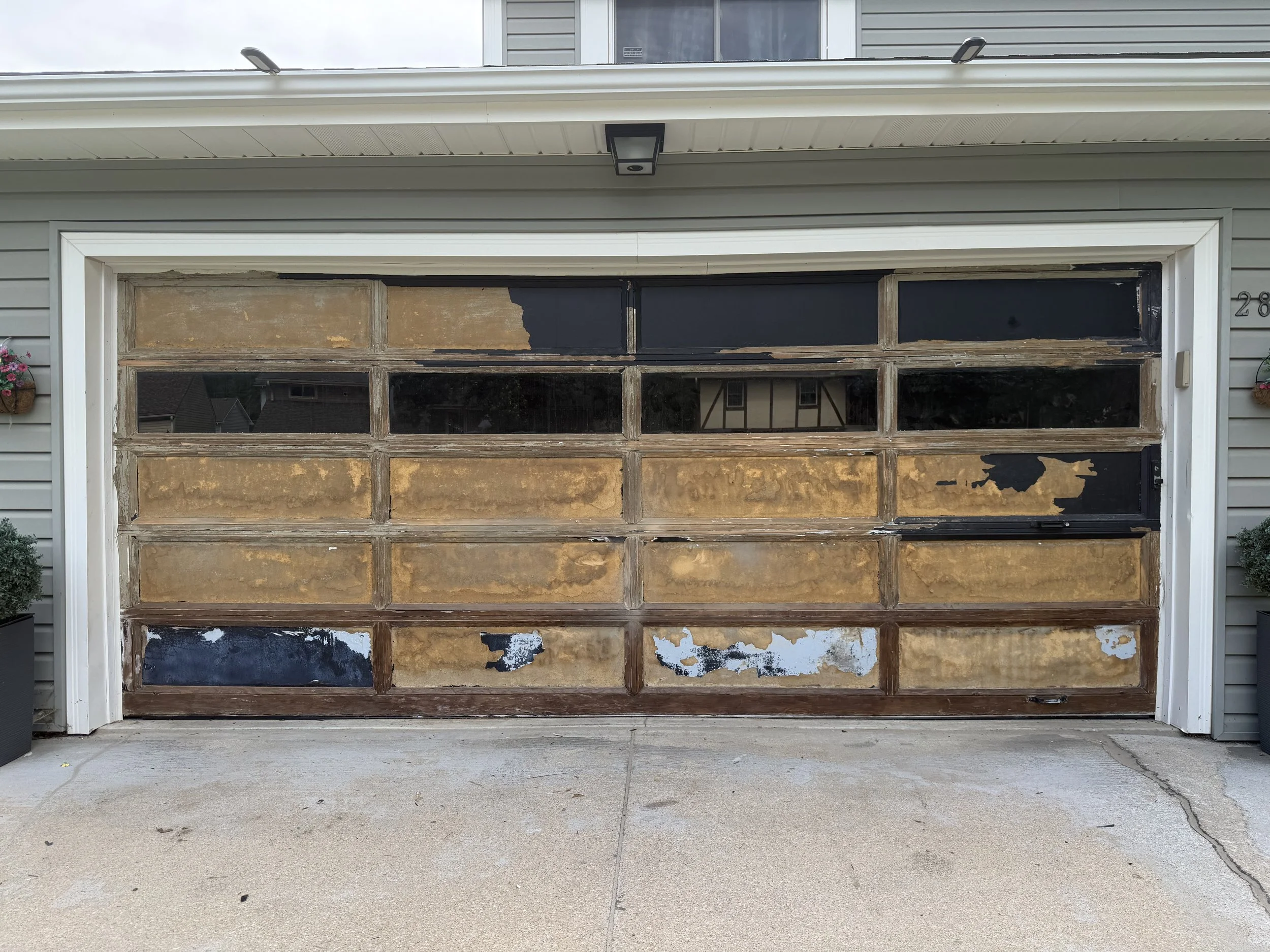 Garage door, worn finish (before)