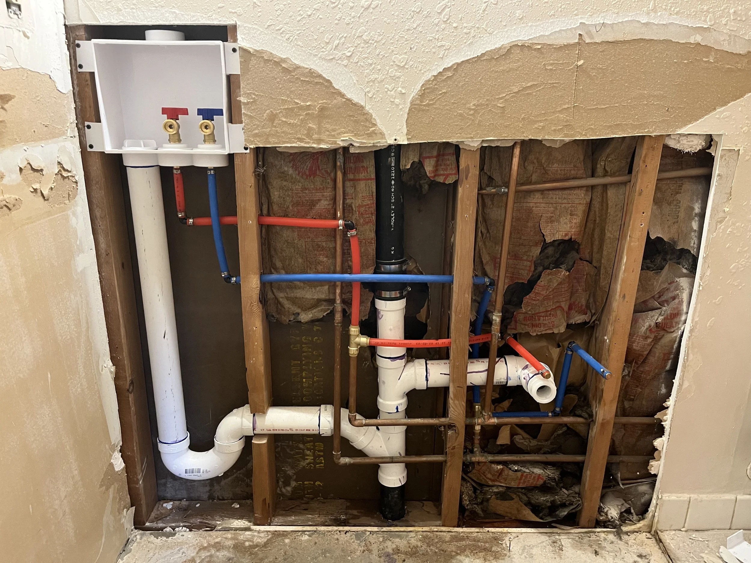 Bathroom plumbing, washer hookup added & sink lines relocated (after)